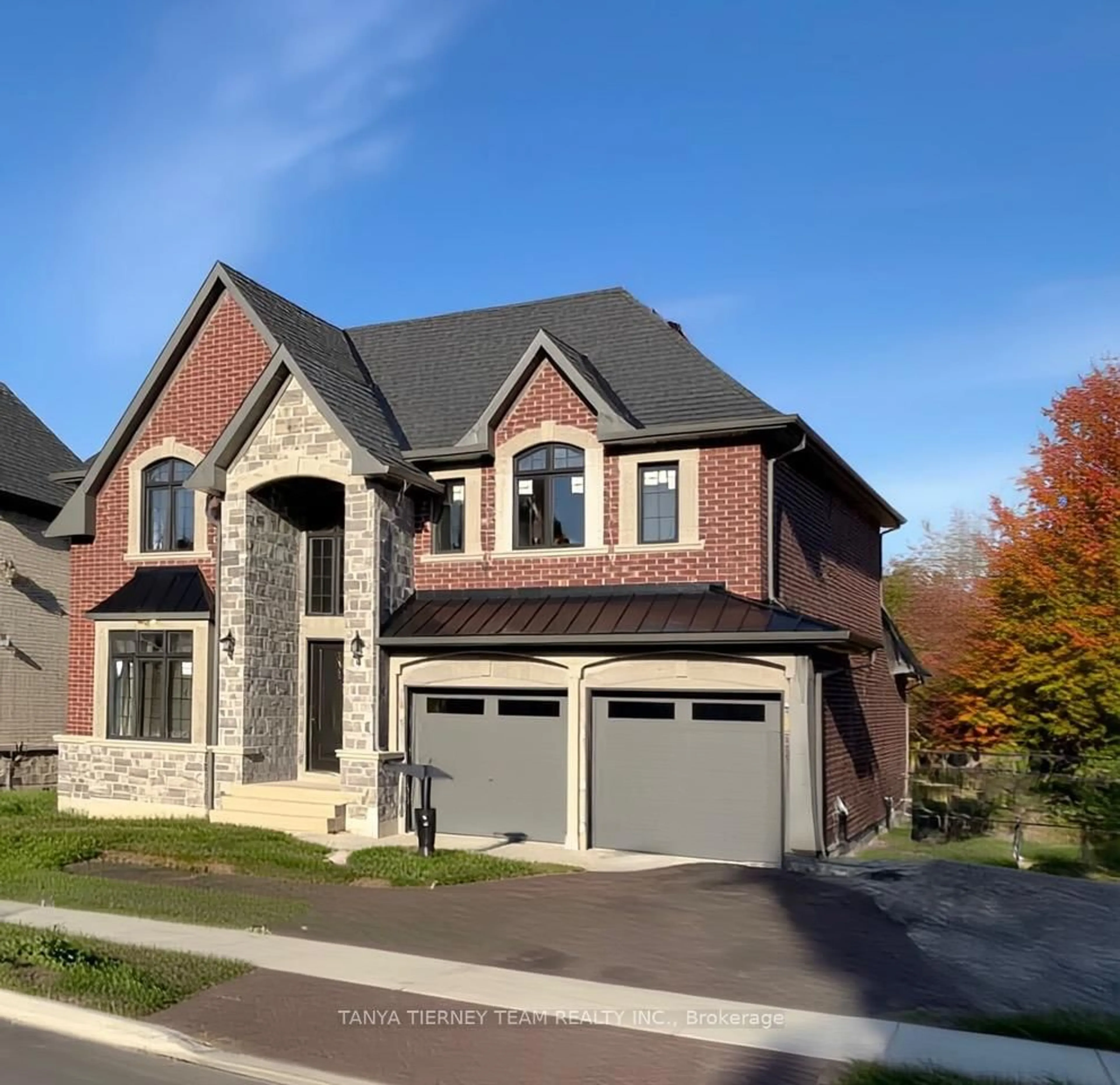 Home with brick exterior material, street for 48 Carnwith Dr, Whitby Ontario L1M 2L1