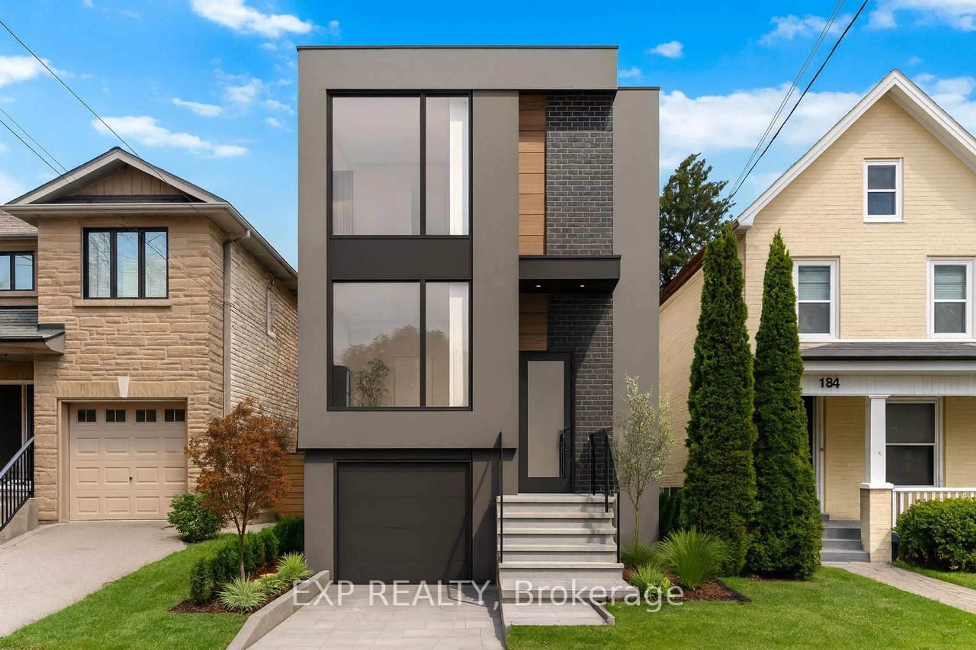 Home with brick exterior material, street for 132 Barrington Ave, Toronto Ontario M4C 4Z2