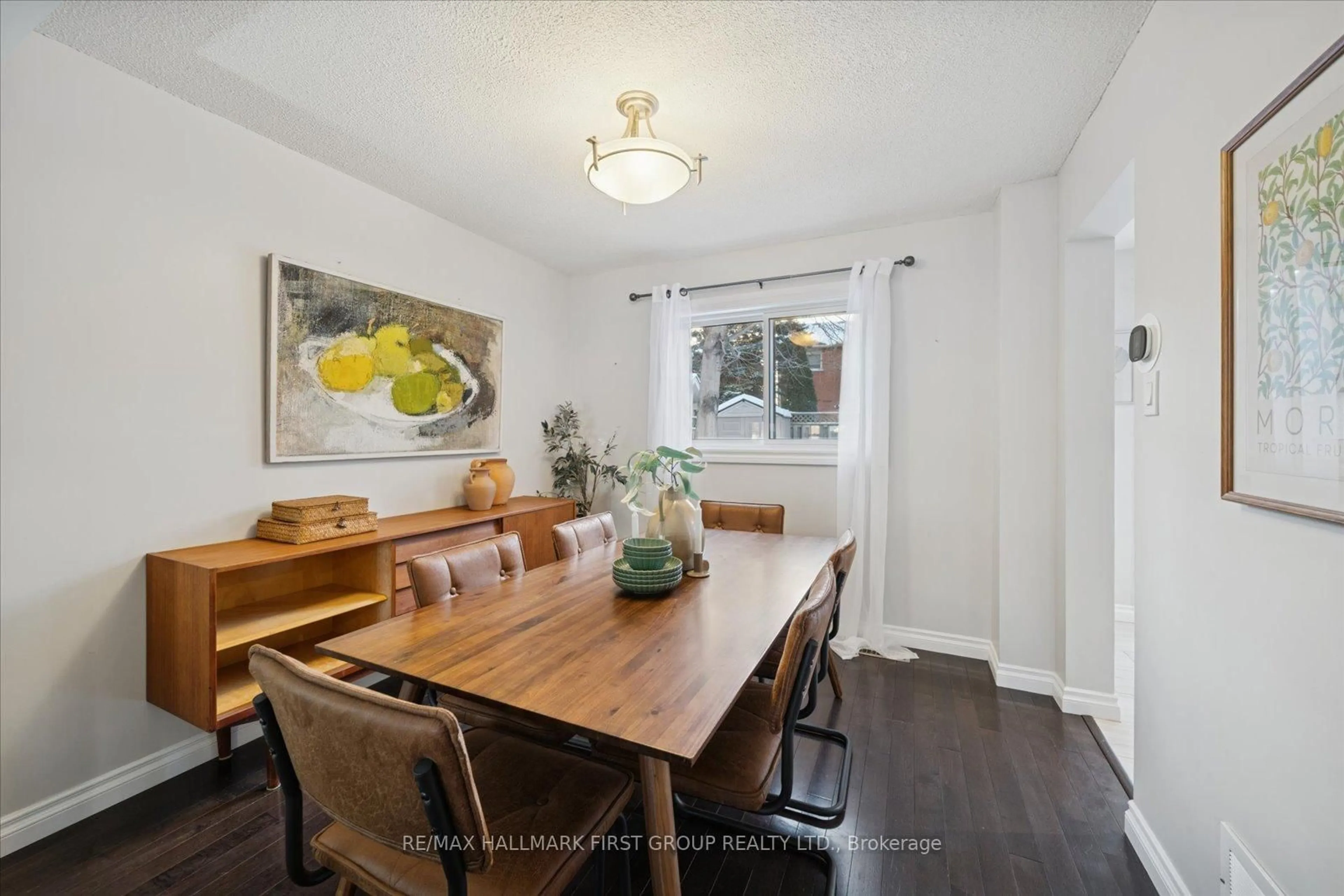 Dining room, wood/laminate floor for 79 Woodstone Pl, Whitby Ontario L1R 1S7