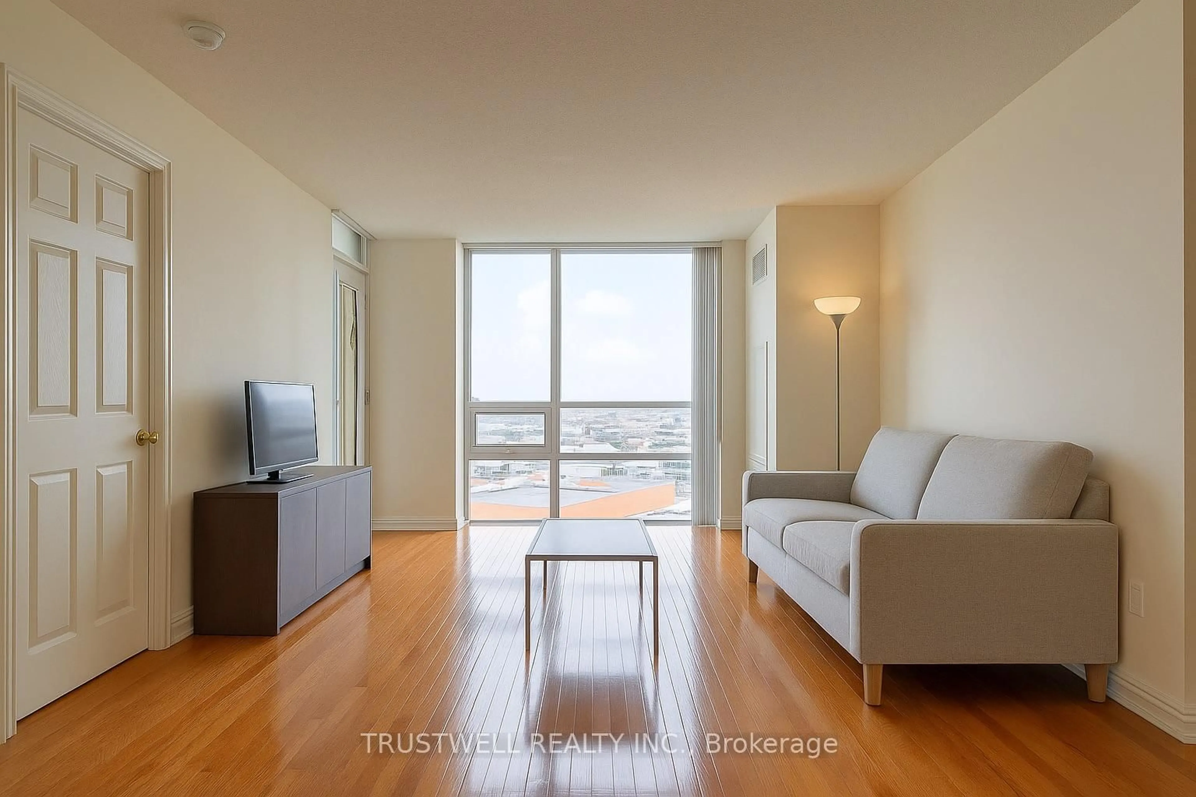 Living room with furniture, wood/laminate floor for 88 Grangeway Ave #1705, Toronto Ontario M1H 0A2