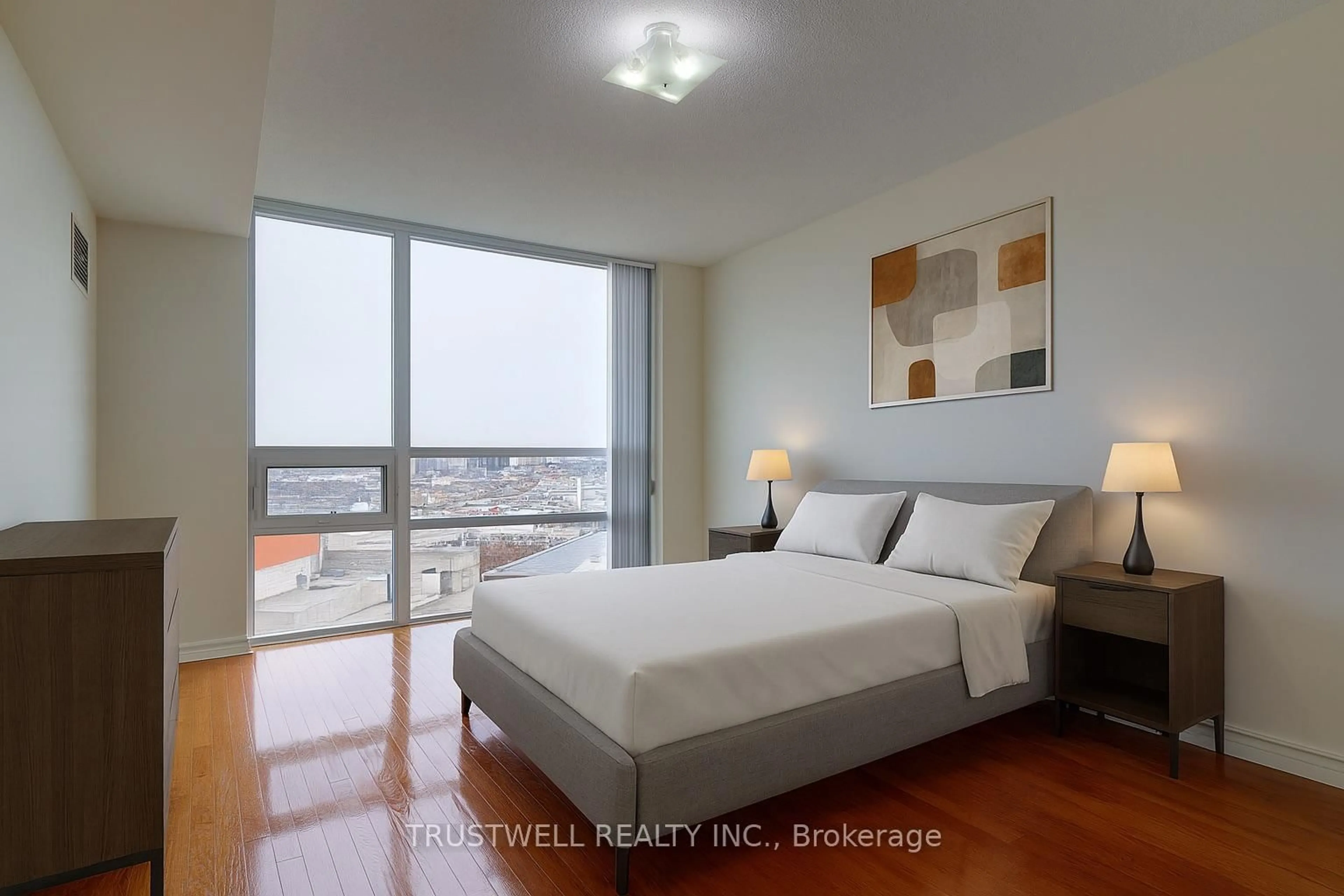 Bedroom with bed, wood/laminate floor for 88 Grangeway Ave #1705, Toronto Ontario M1H 0A2