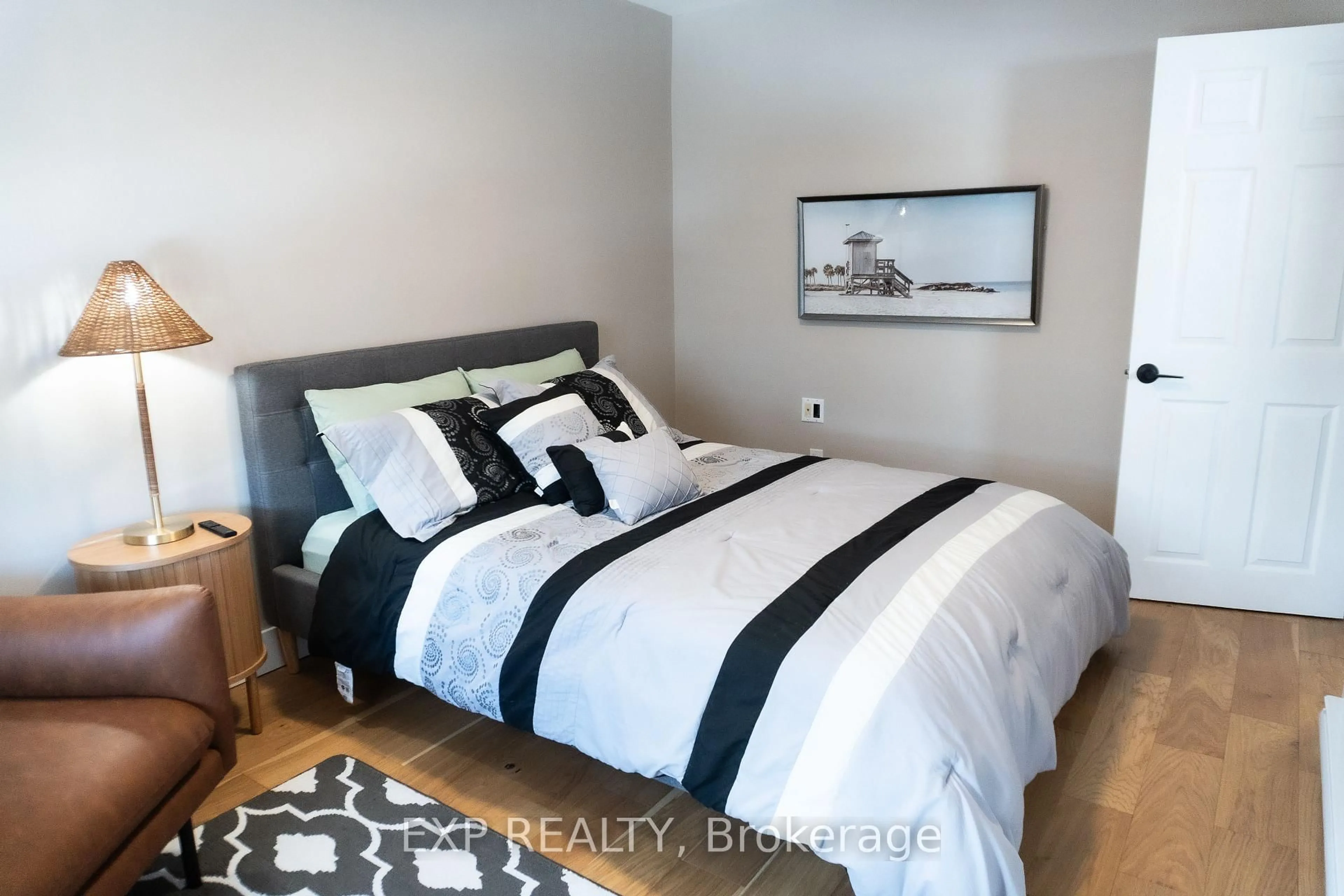 Bedroom with bed, wood/laminate floor for 1515 Dufferin St, Whitby Ontario L1N 1B3