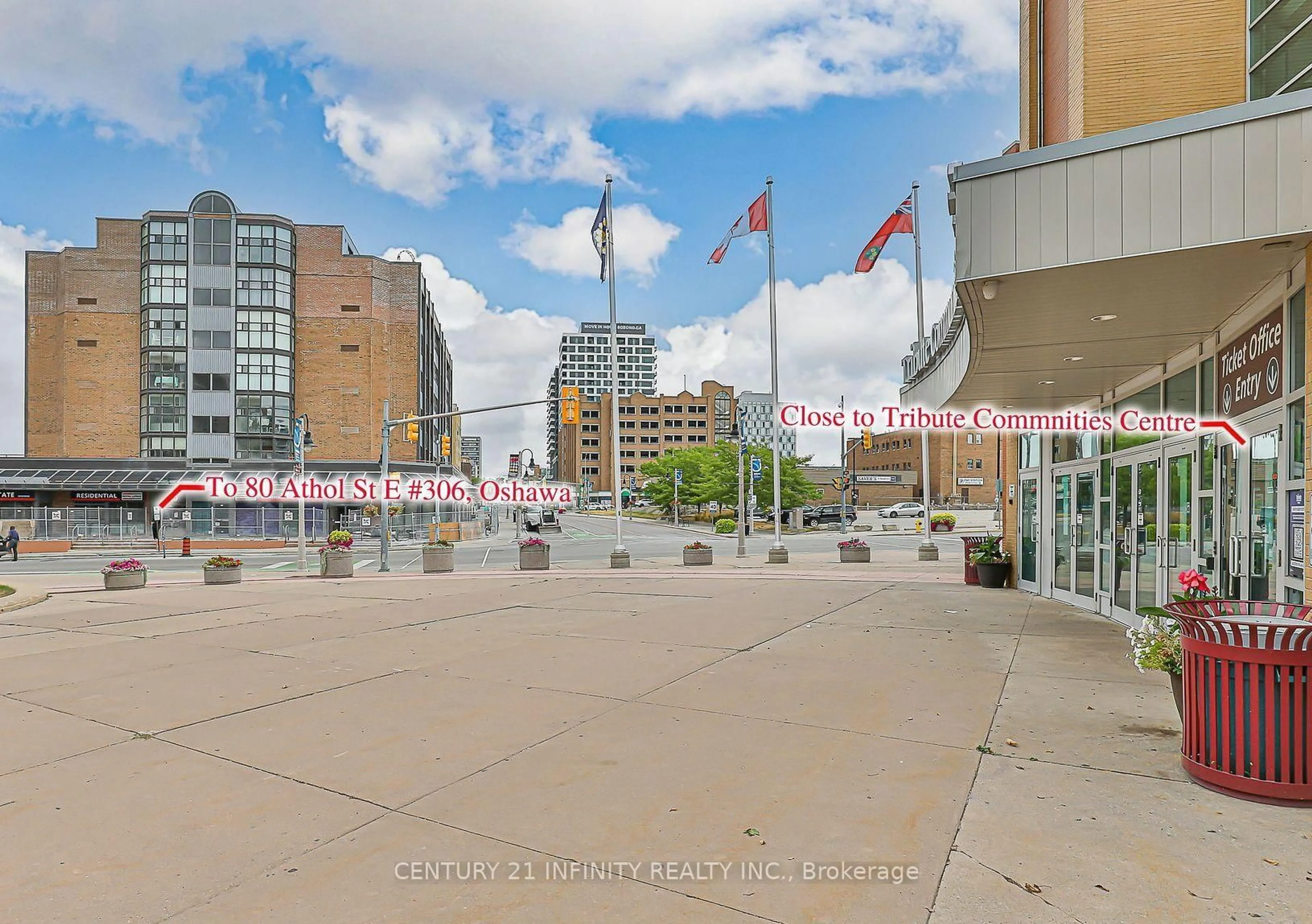 Patio, city buildings view from balcony for 80 Athol St #306, Oshawa Ontario L1H 8B7