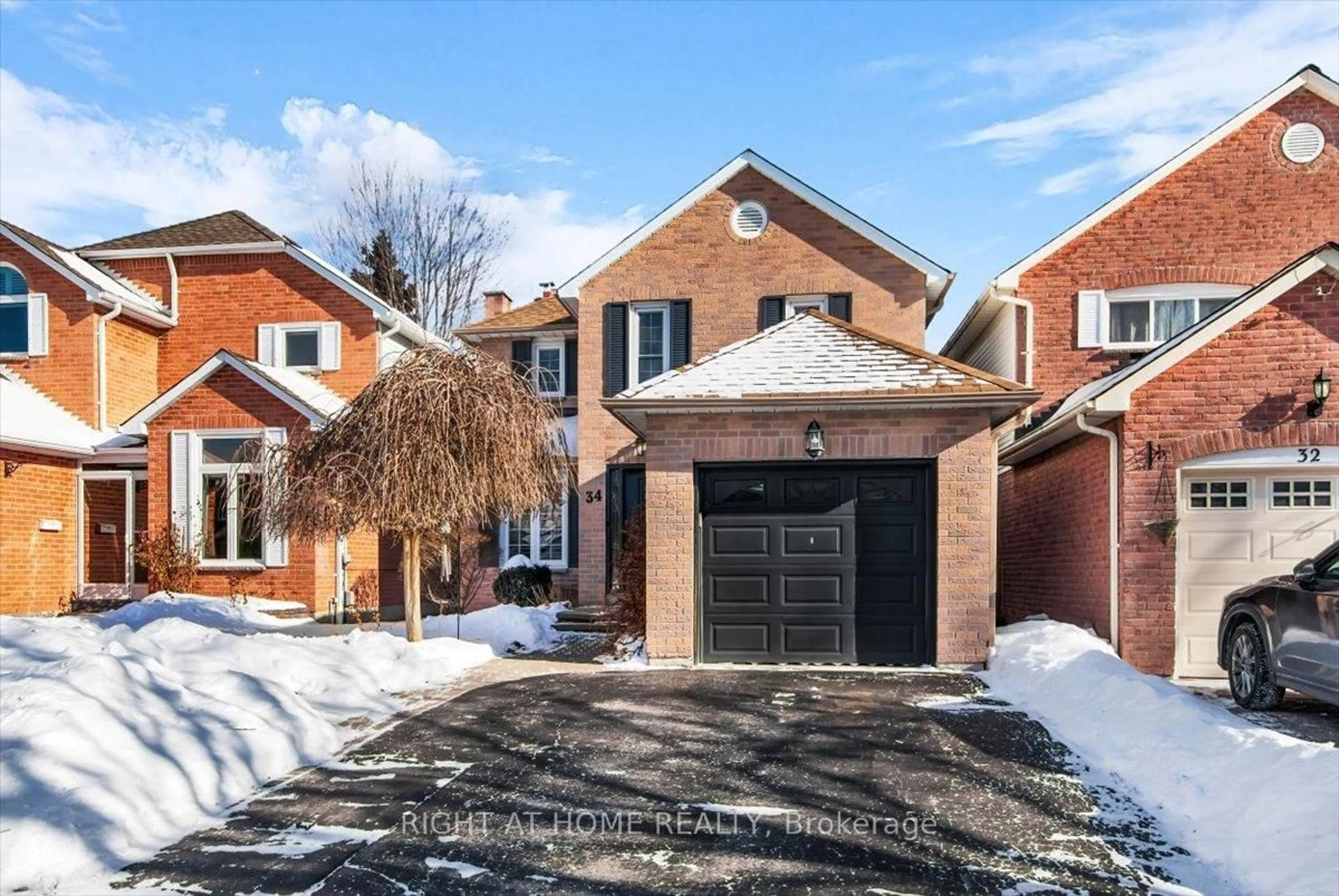 Home with brick exterior material, street for 34 Bashford Rd, Ajax Ontario L1S 3Y2