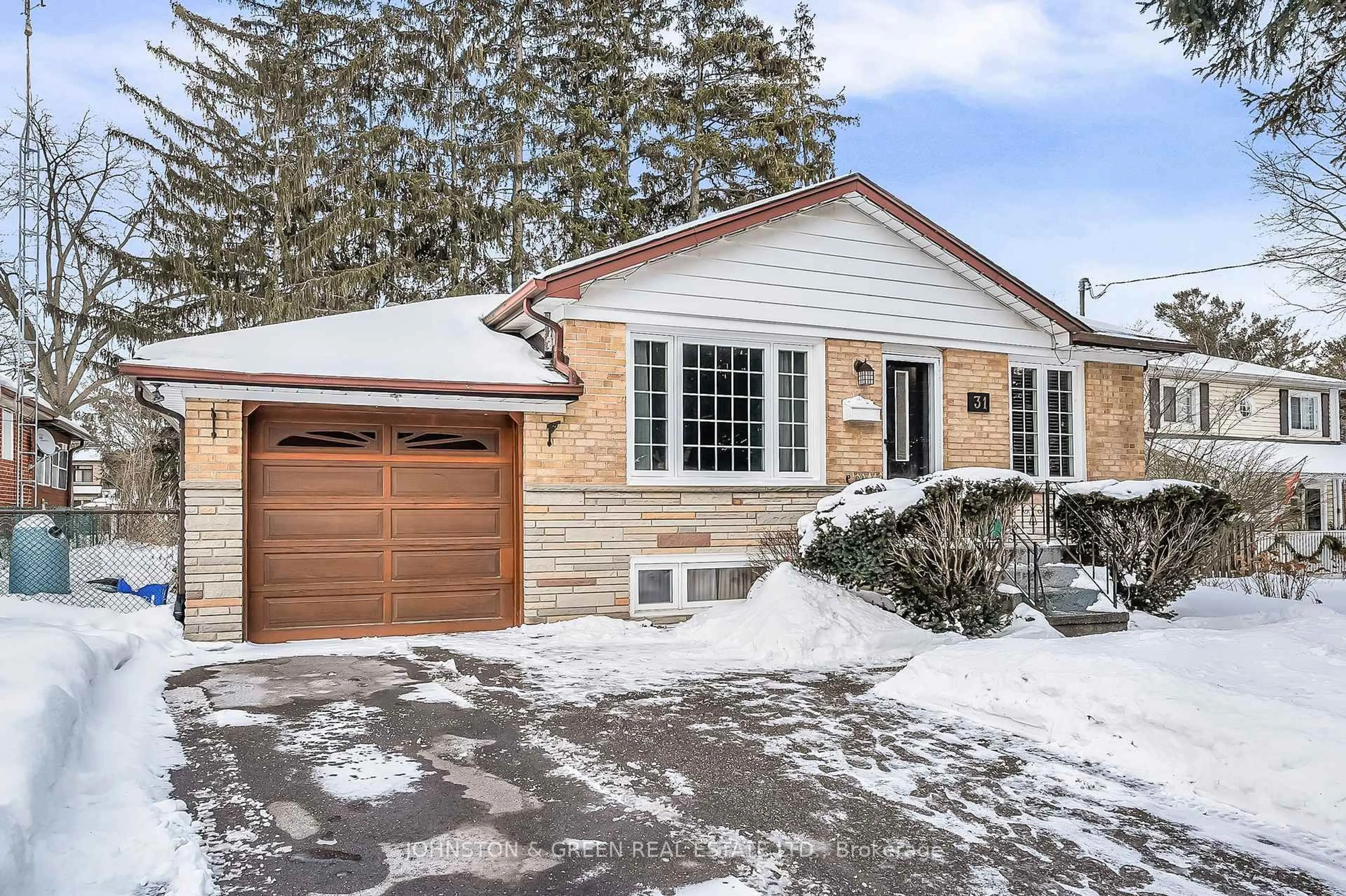 Home with brick exterior material, street for 31 Flerimac Rd, Toronto Ontario M4C 3G5