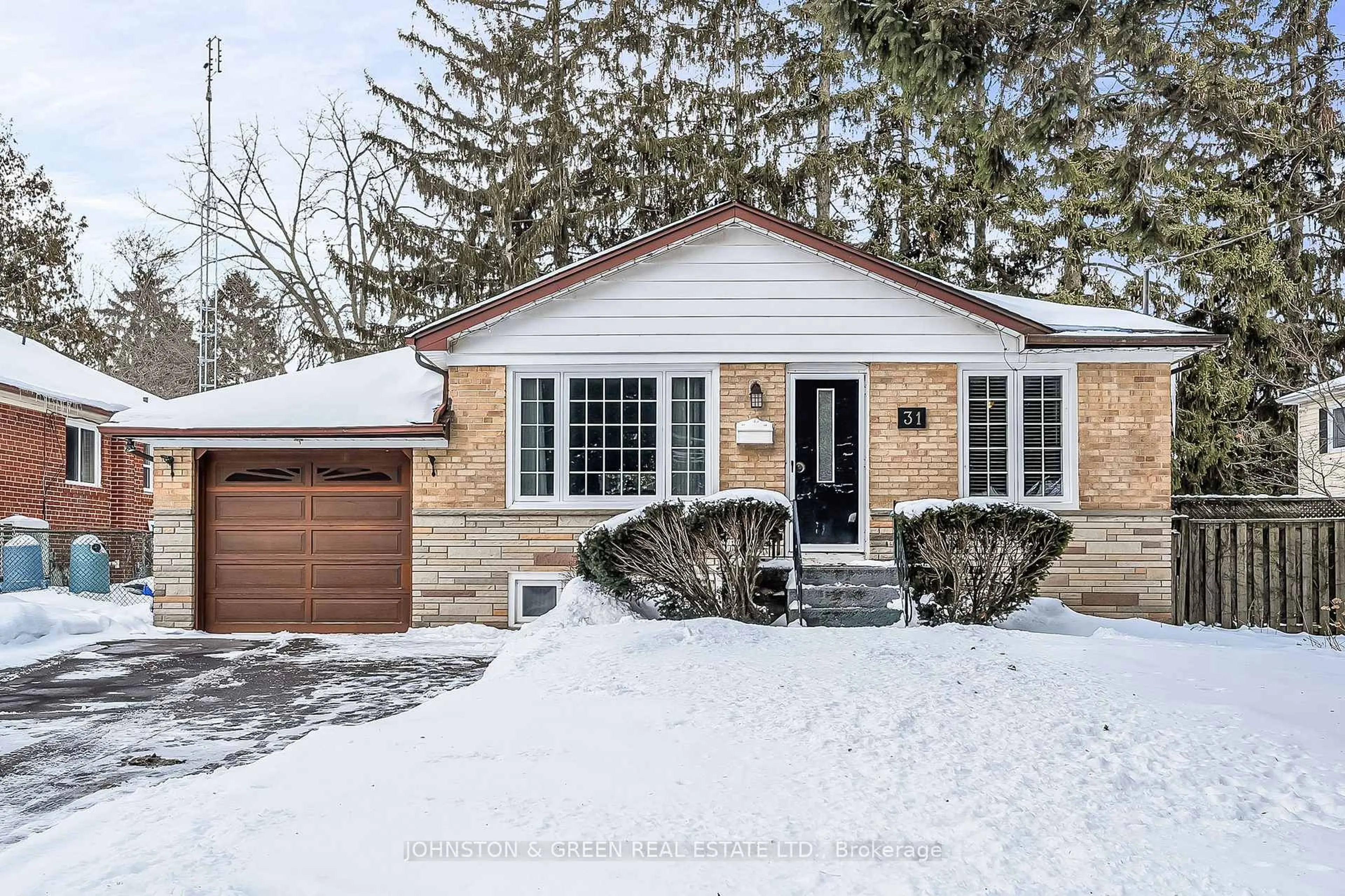 Home with brick exterior material, street for 31 Flerimac Rd, Toronto Ontario M4C 3G5