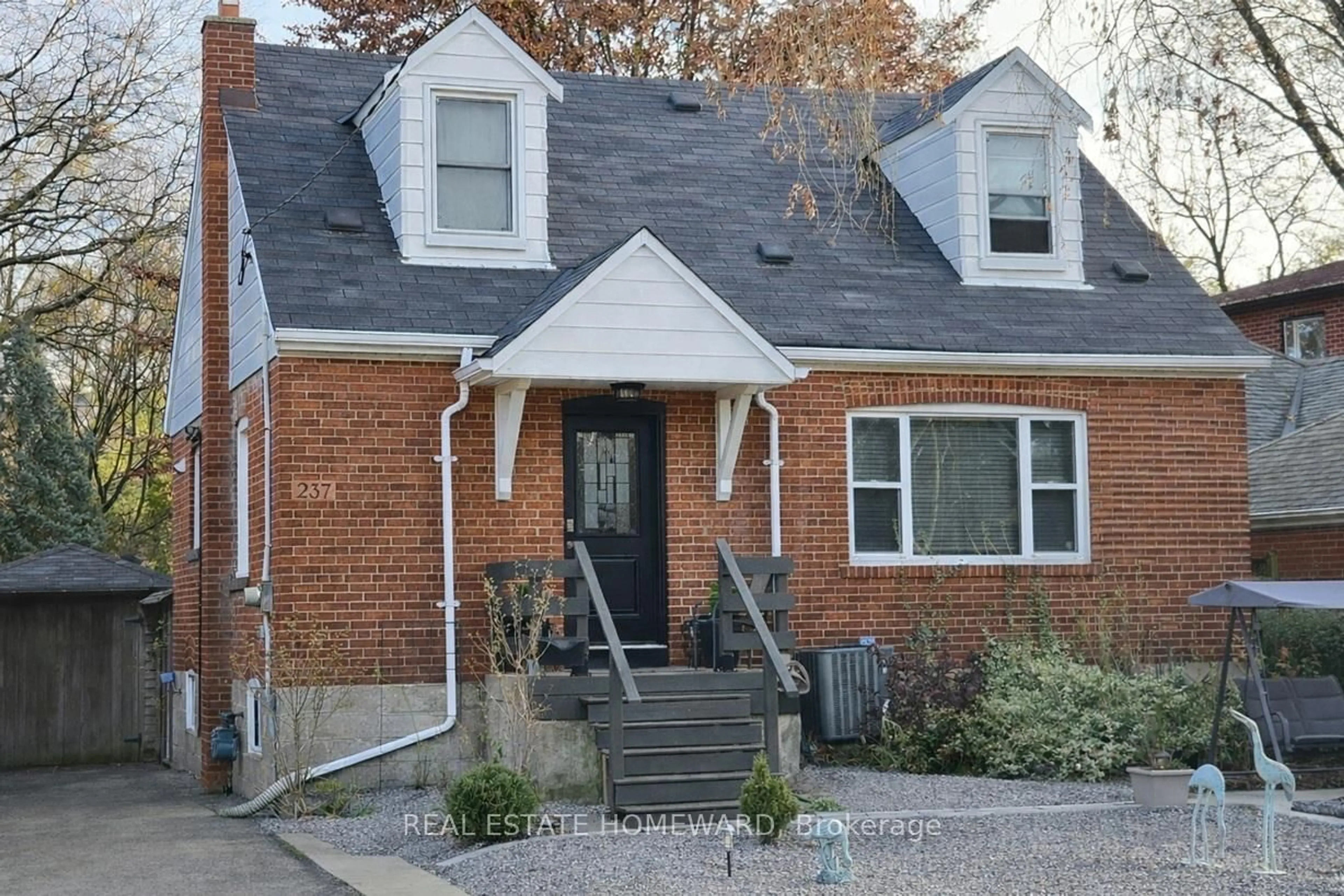 Home with brick exterior material, street for 237 Ferris Rd, Toronto Ontario M4B 1H2