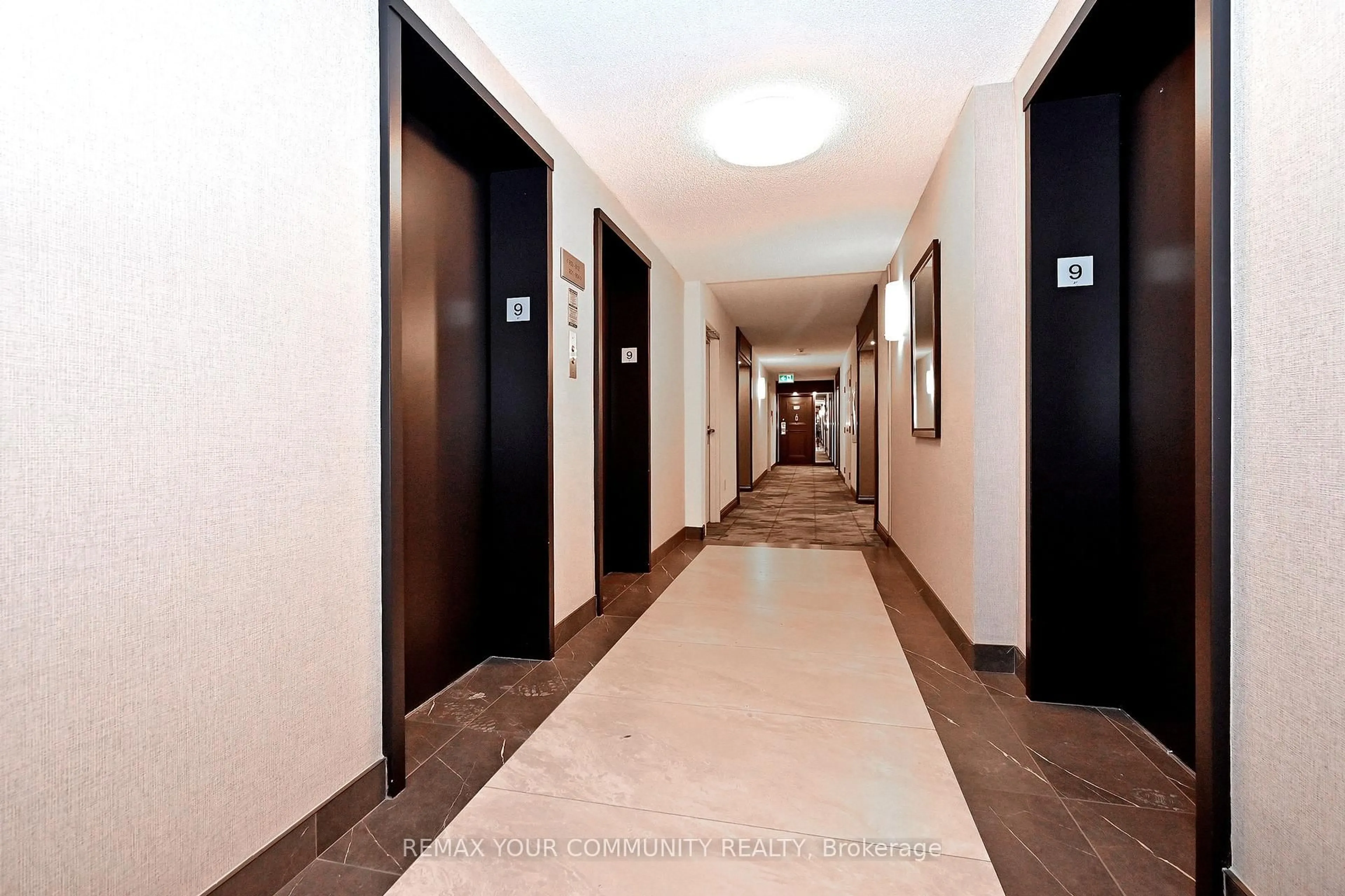 Indoor foyer for 275 Bamburgh Circ #910, Toronto Ontario M1W 3X4