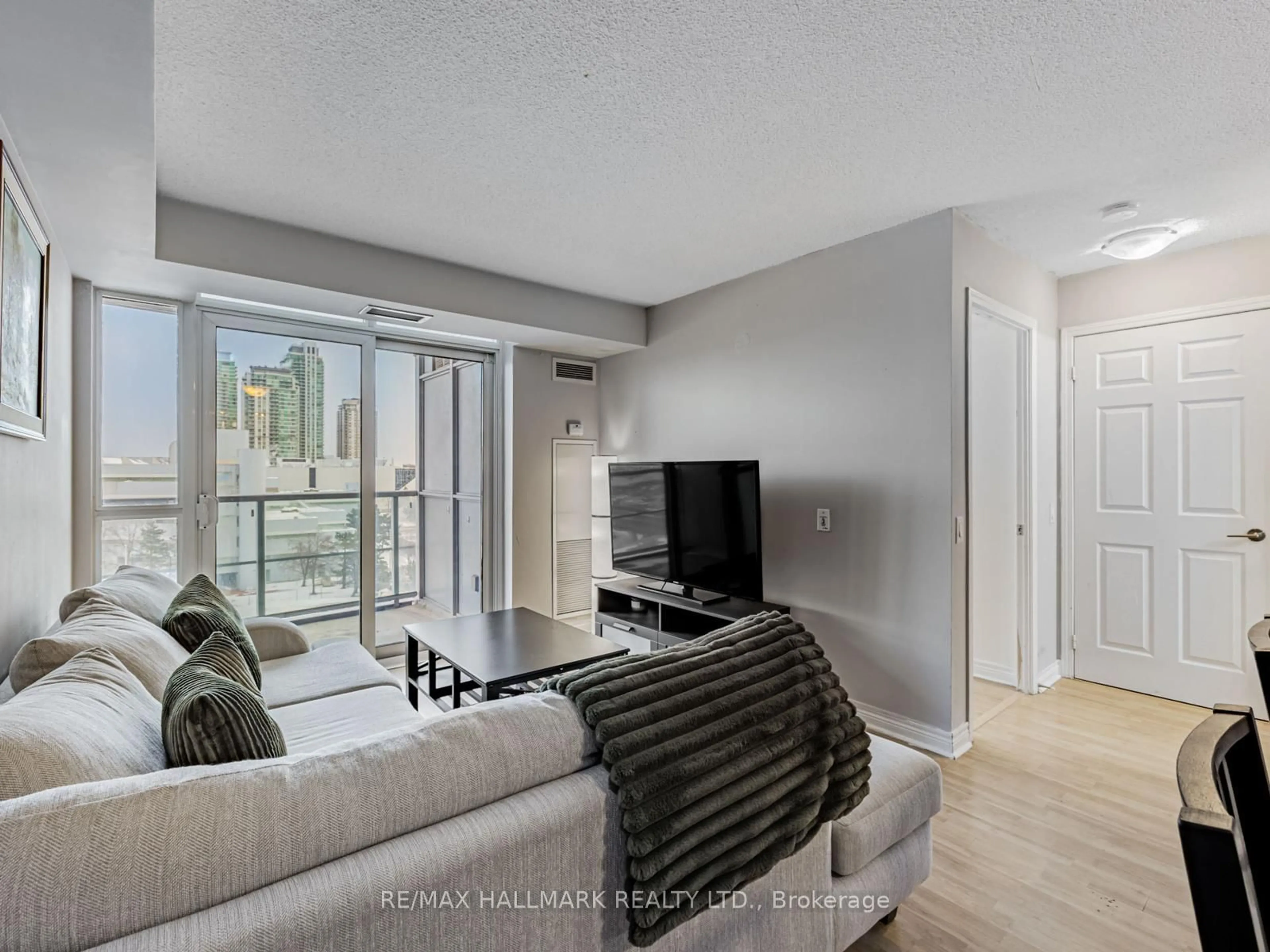 Living room with furniture, unknown for 83 Borough Dr #708, Toronto Ontario M1P 5E4