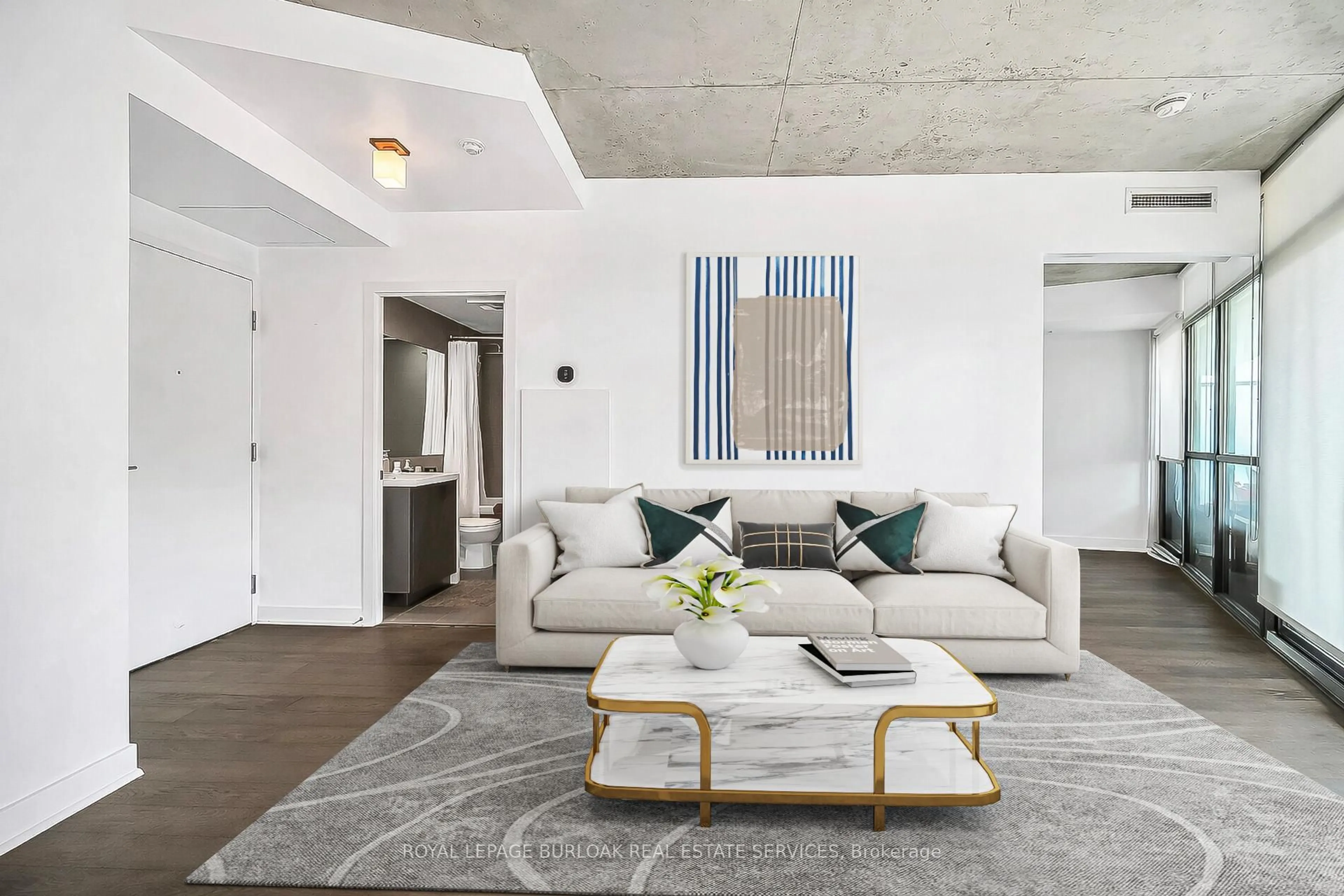 Living room with furniture, cement floor for 1201 Dundas St #902, Toronto Ontario M4M 1S2