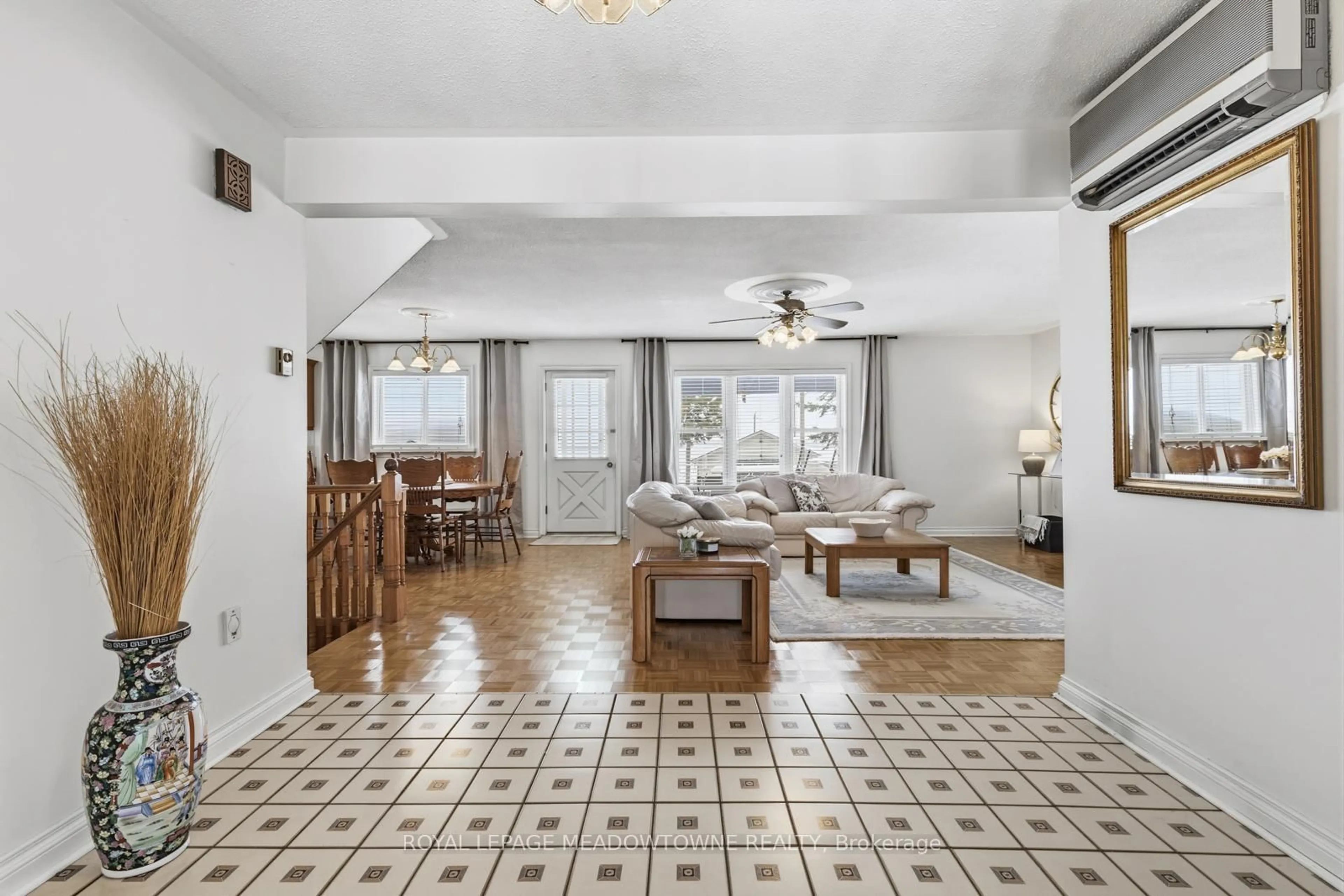 Living room with furniture, ceramic/tile floor for 61 Aldred Dr, Scugog Ontario L9L 1B4