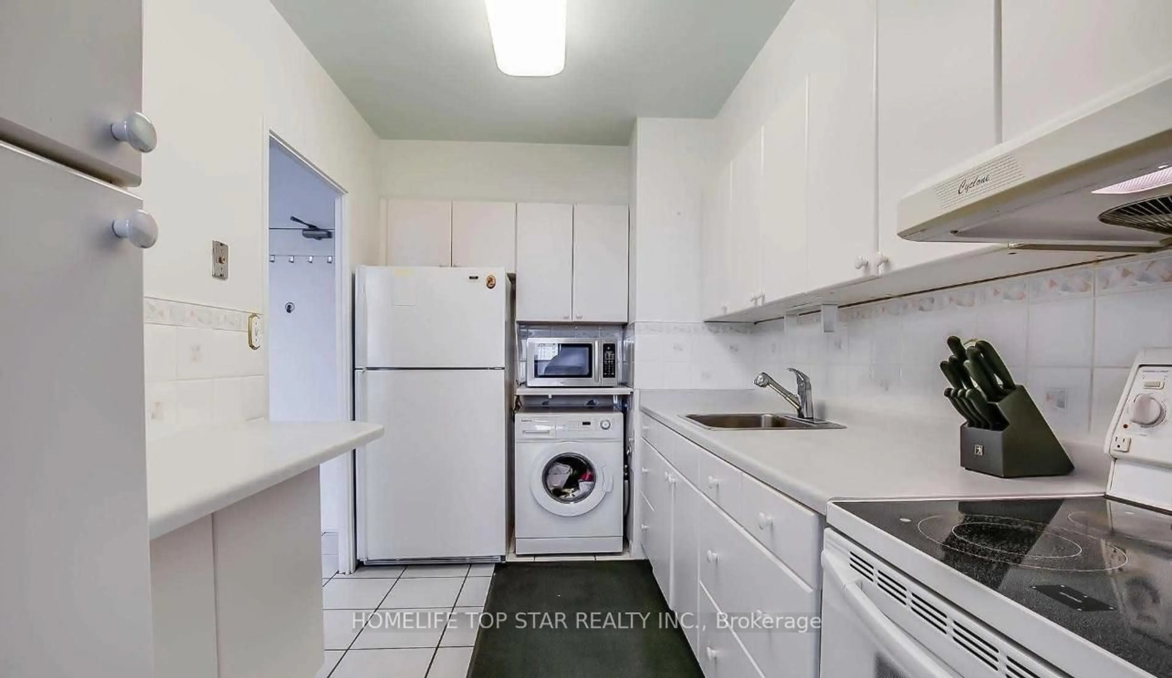 Standard kitchen, unknown for 5 Massey Sq #1806, Toronto Ontario M4C 5L6