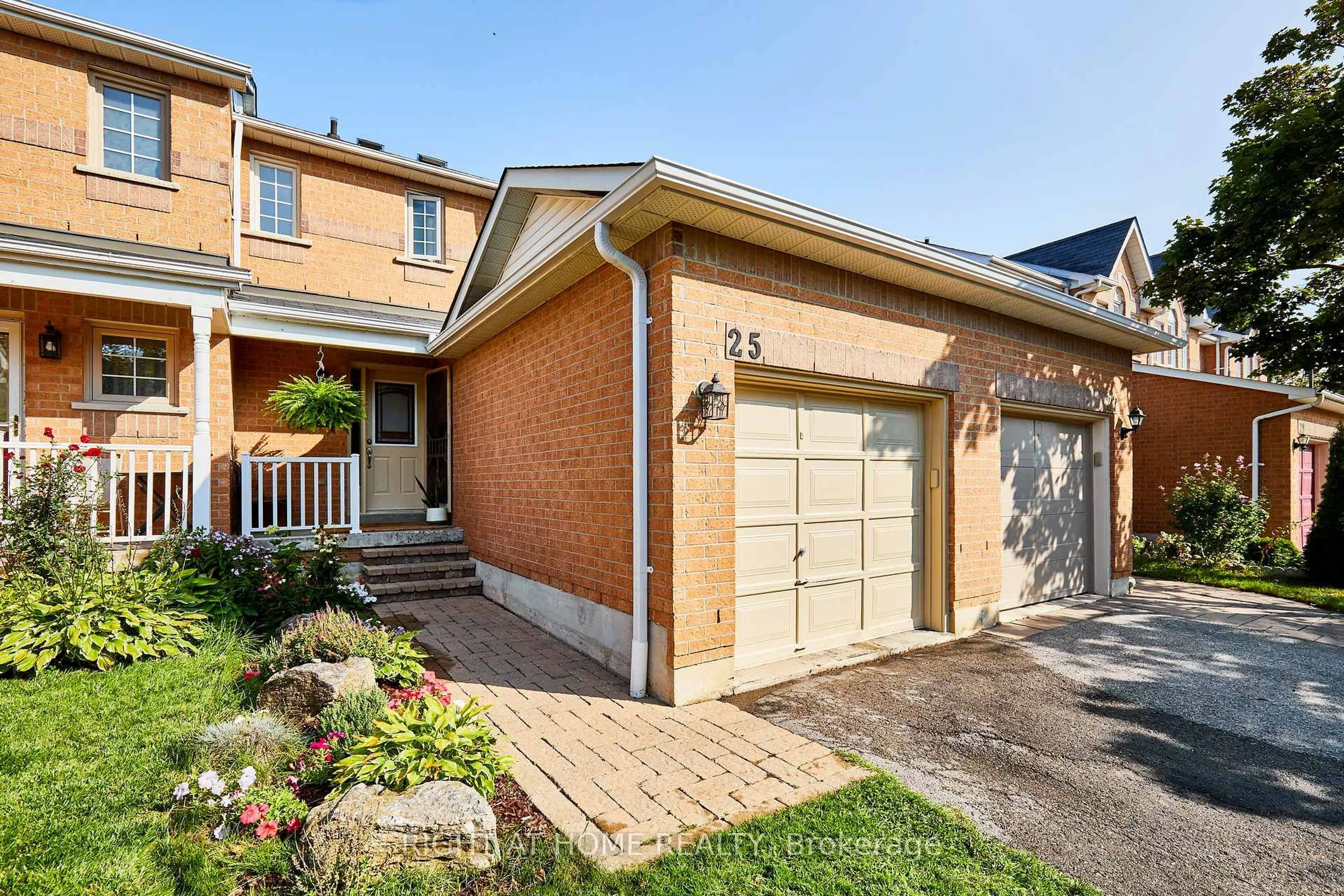Home with brick exterior material, street for 25 Macintyre Lane, Ajax Ontario L1T 3X4