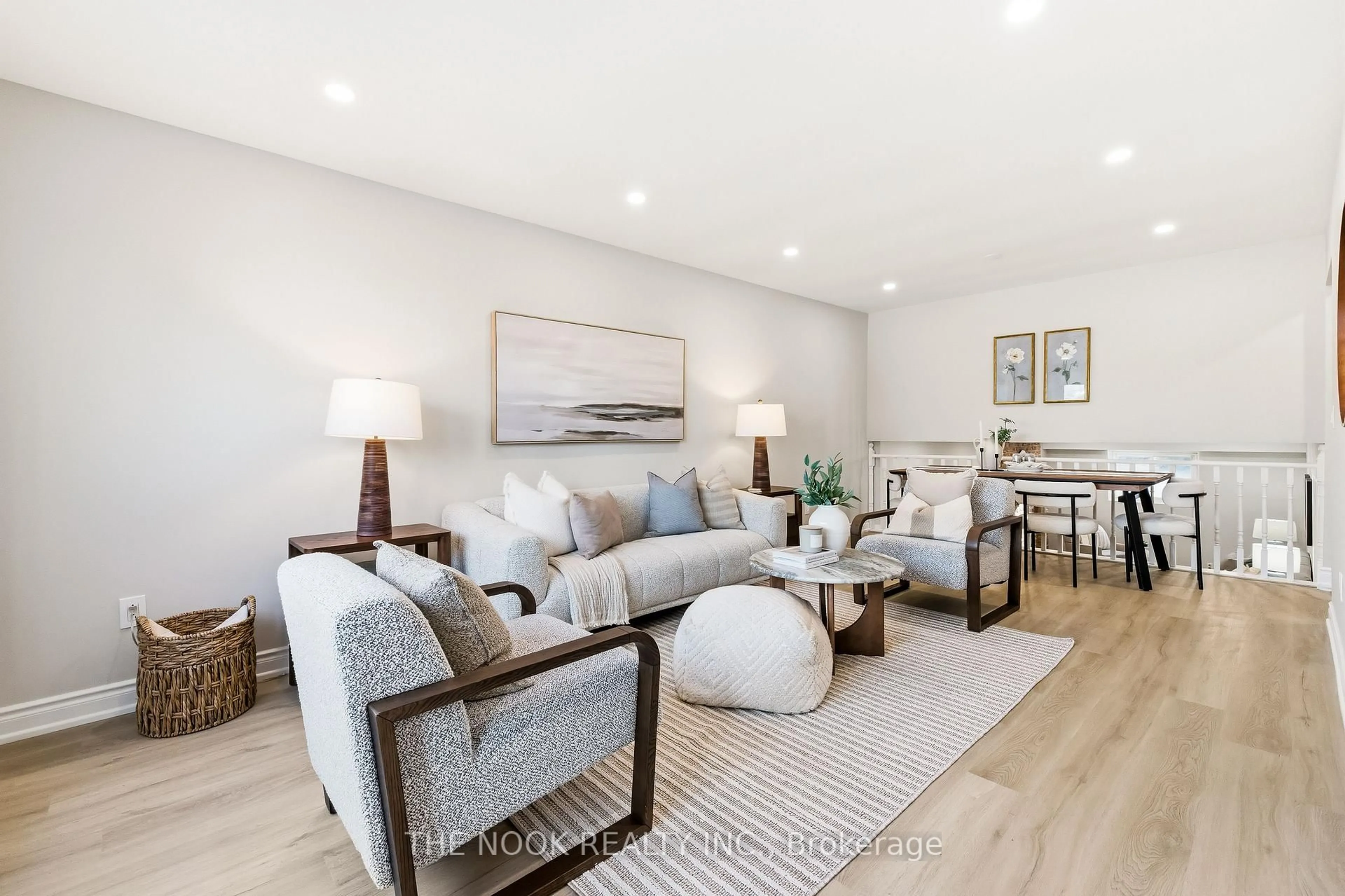 Living room with furniture, wood/laminate floor for 629 Capilano Cres, Oshawa Ontario L1H 7V3