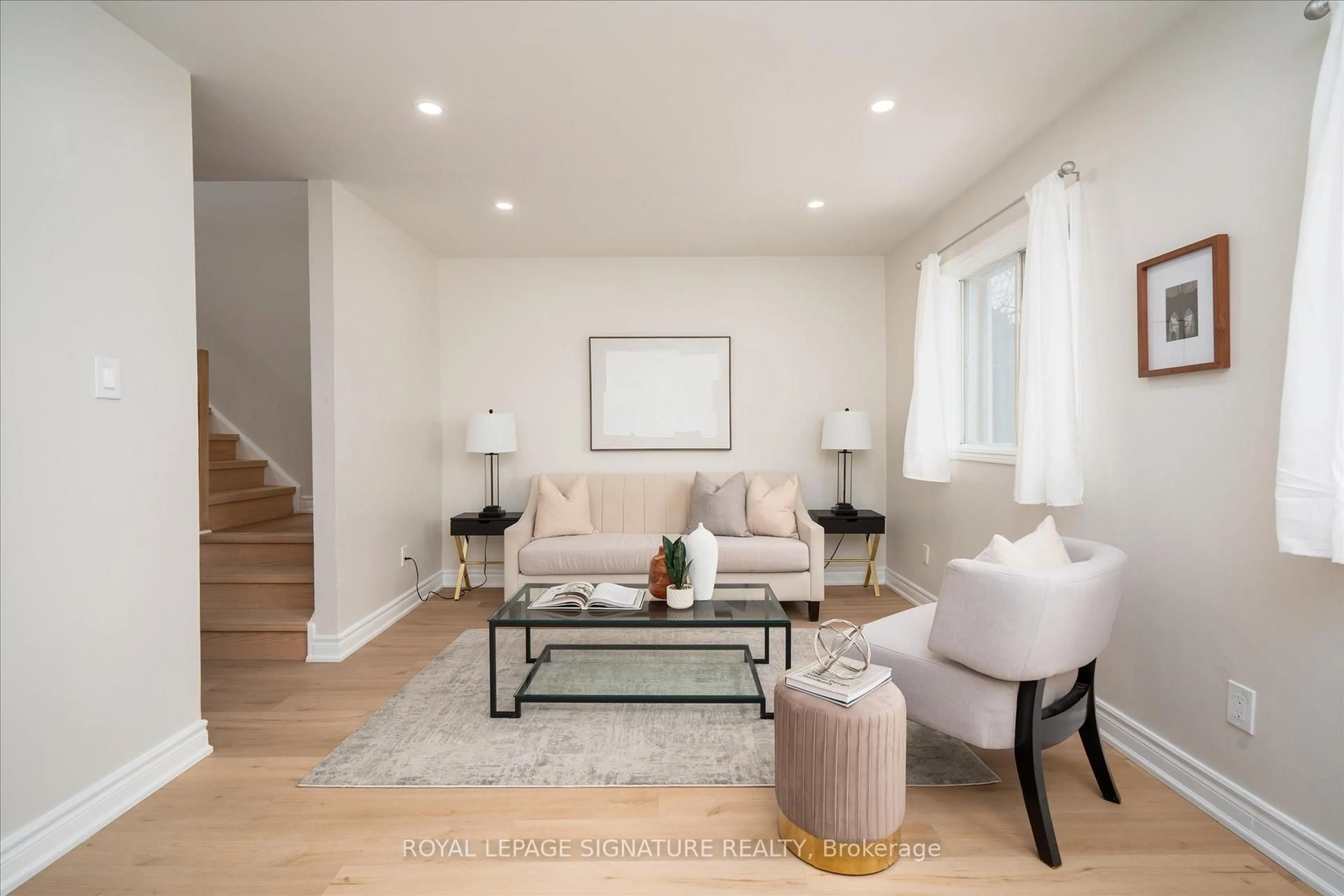 Living room with furniture, wood/laminate floor for 200 Murison Blvd #8, Toronto Ontario M1B 3S1