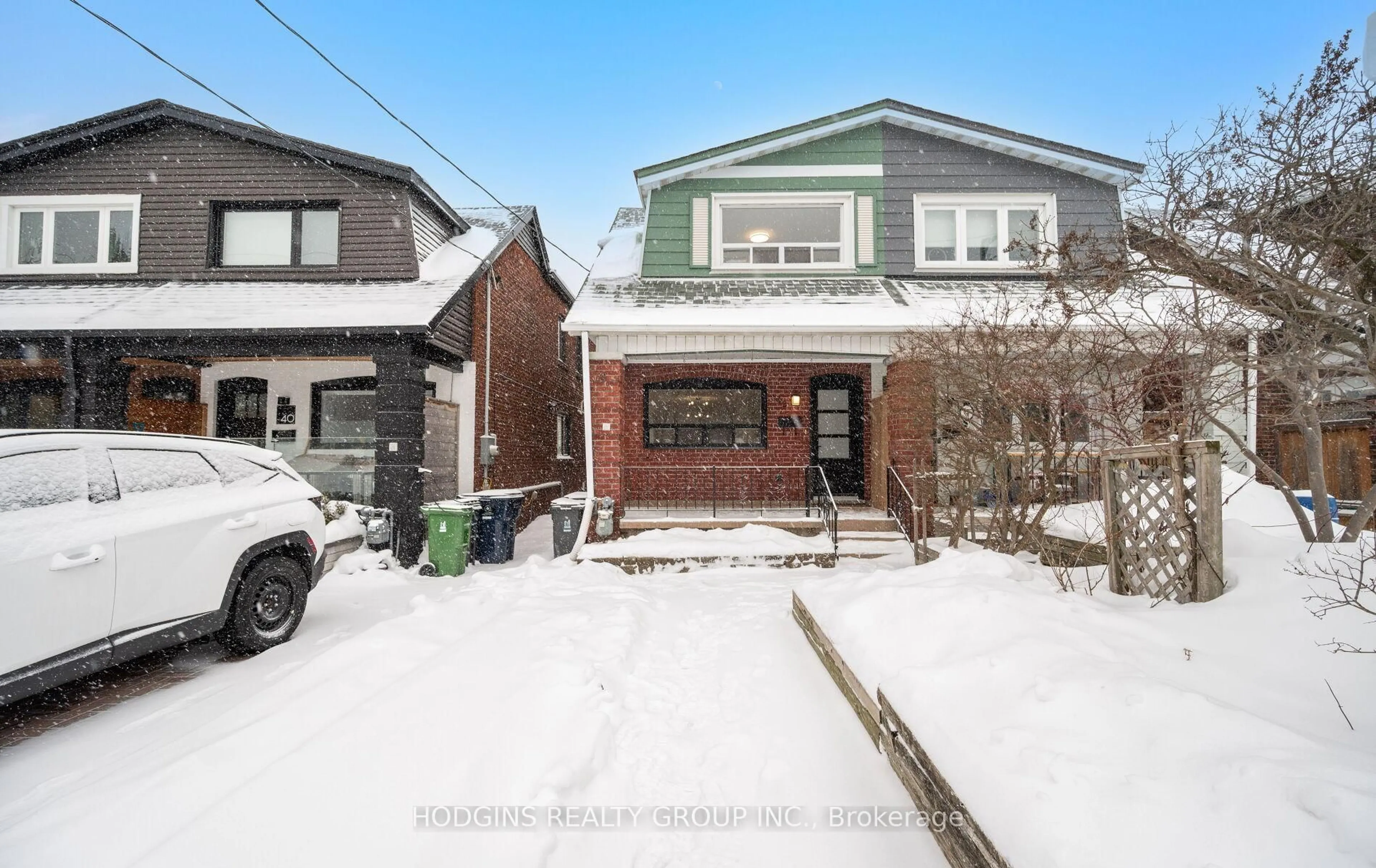 Home with brick exterior material, street for 42 Durant Ave, Toronto Ontario M4J 4V9