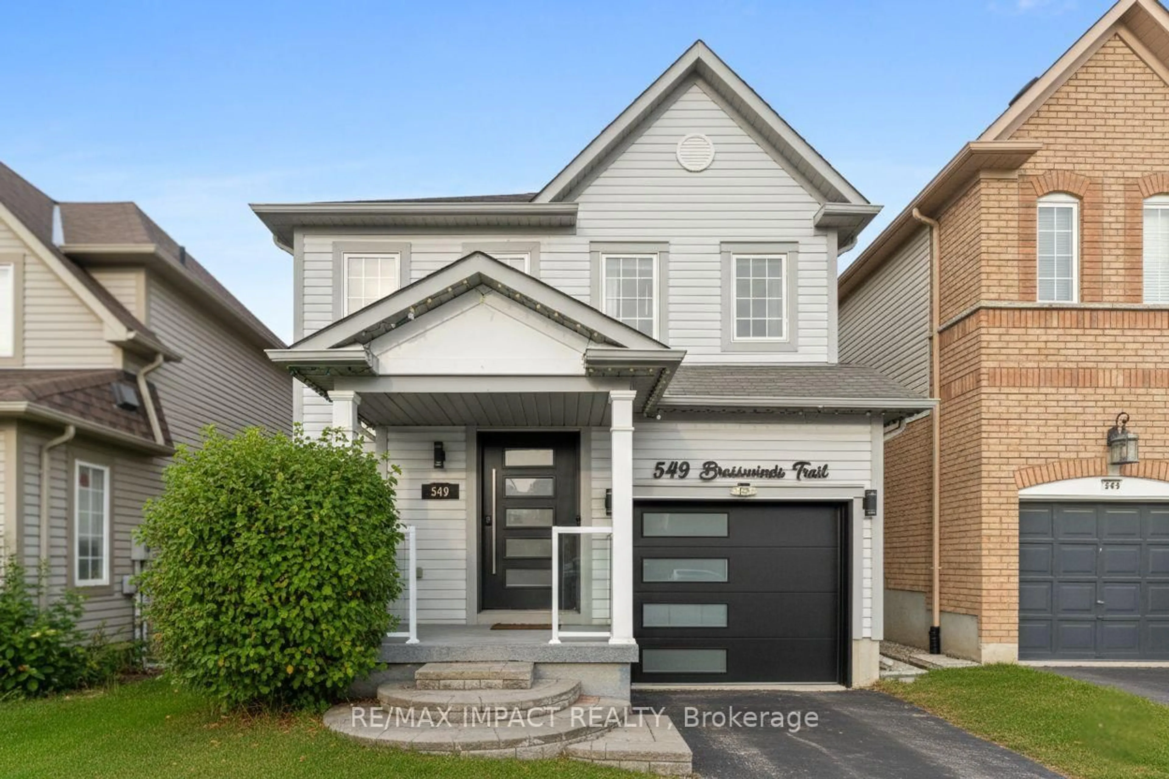 Home with brick exterior material, street for 549 Brasswinds Tr, Oshawa Ontario L1K 2Y9