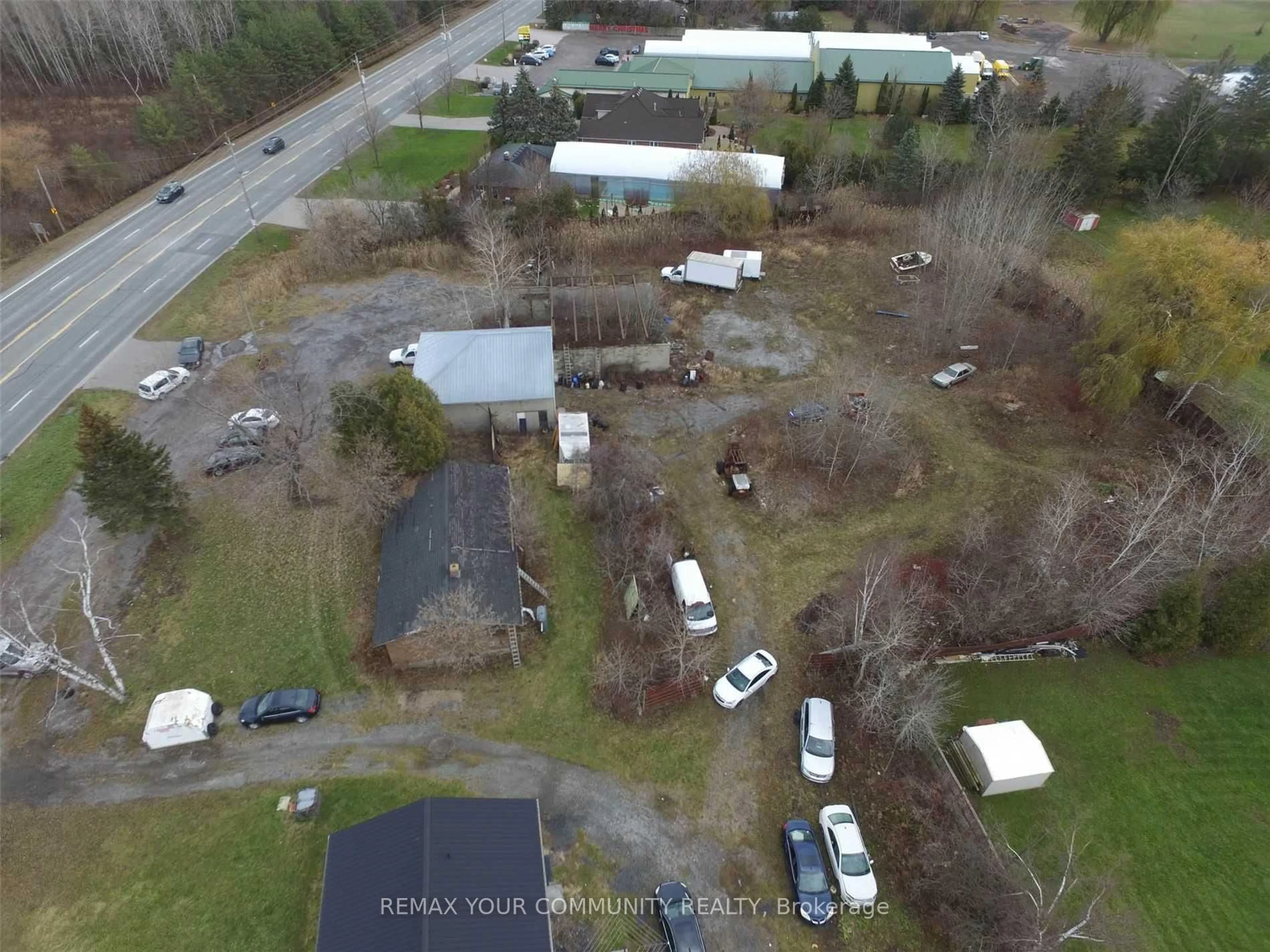 A pic from outside/outdoor area/front of a property/back of a property/a pic from drone, street for 1953 Highway 2 Rd, Clarington Ontario L1C 4V4
