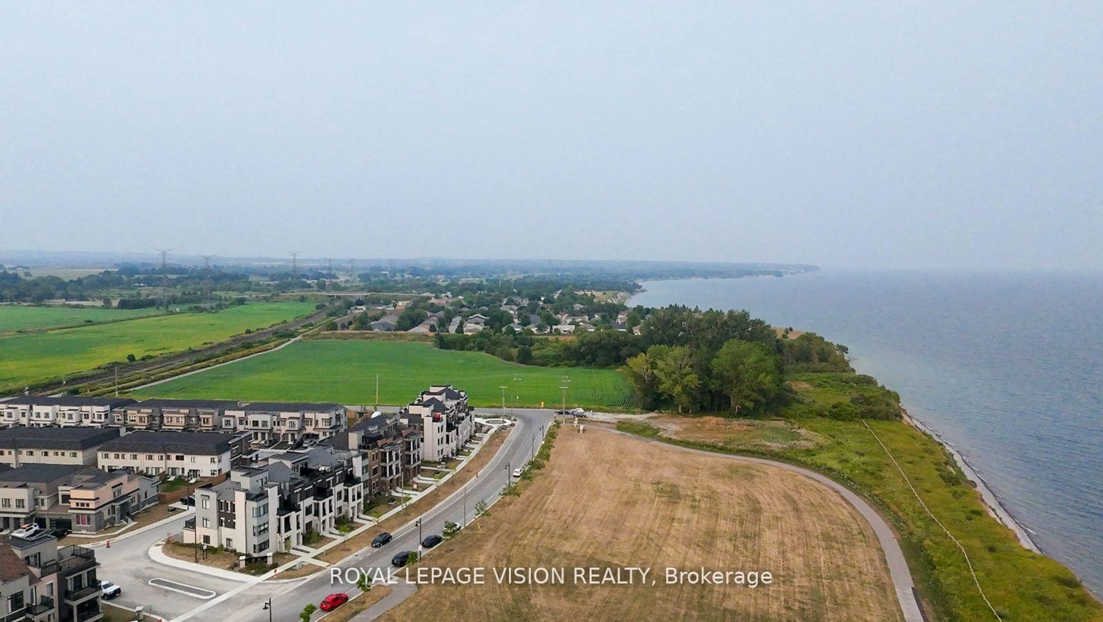 A pic from outside/outdoor area/front of a property/back of a property/a pic from drone, water/lake/river/ocean view for 74 Caspian Sq, Clarington Ontario L1C 7G4