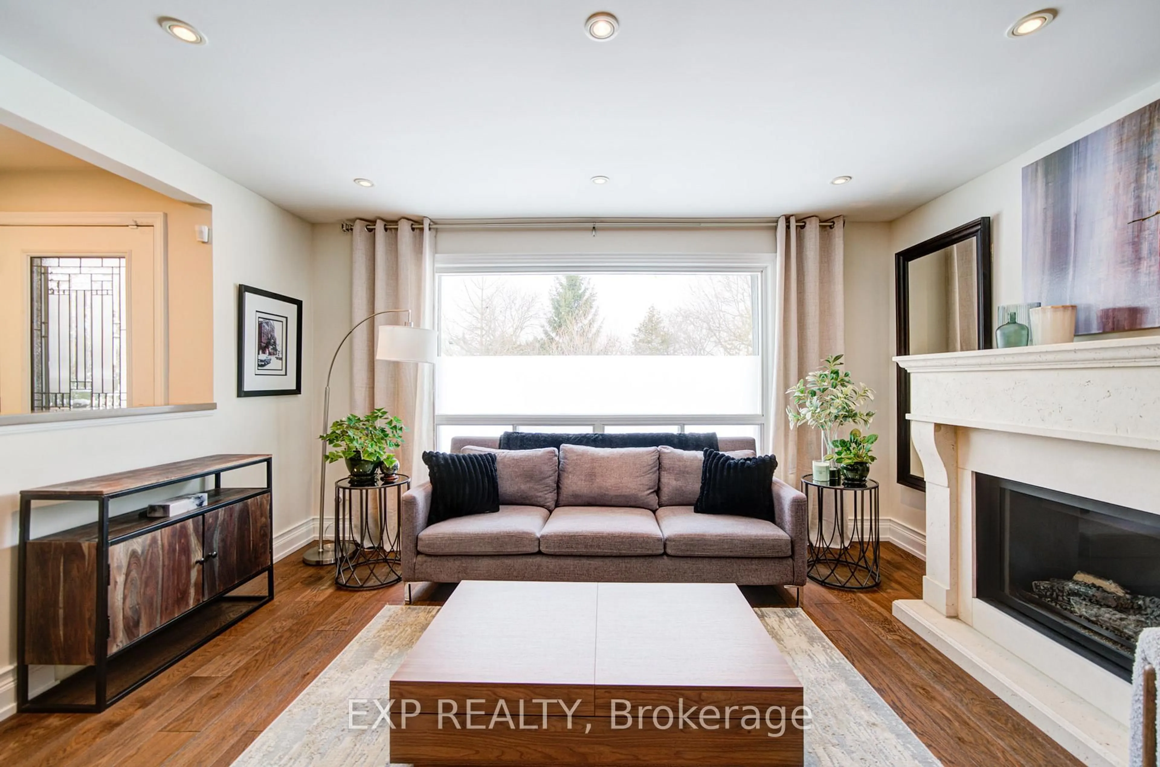 Living room with furniture, wood/laminate floor for 47 Brenda Cres, Toronto Ontario M1K 3C5