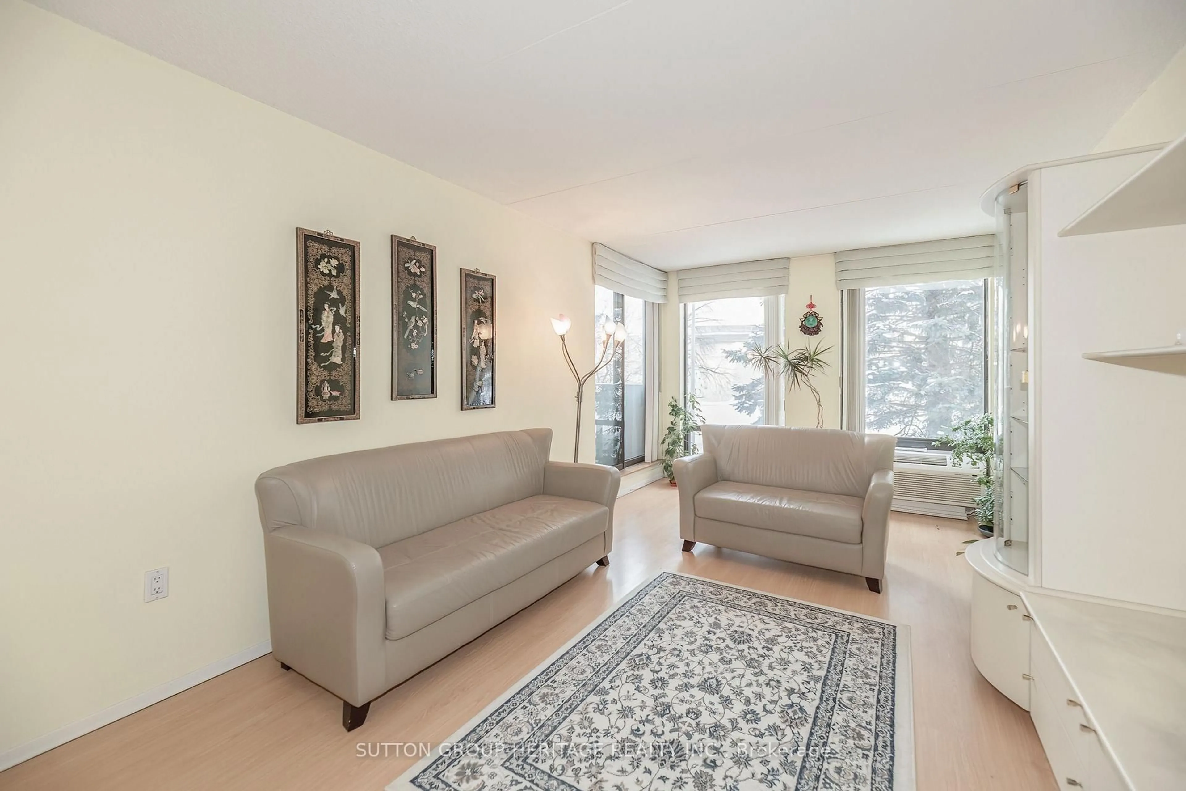 Living room with furniture, unknown for 1525 Diefenbaker Crt #210, Pickering Ontario L1V 3W1