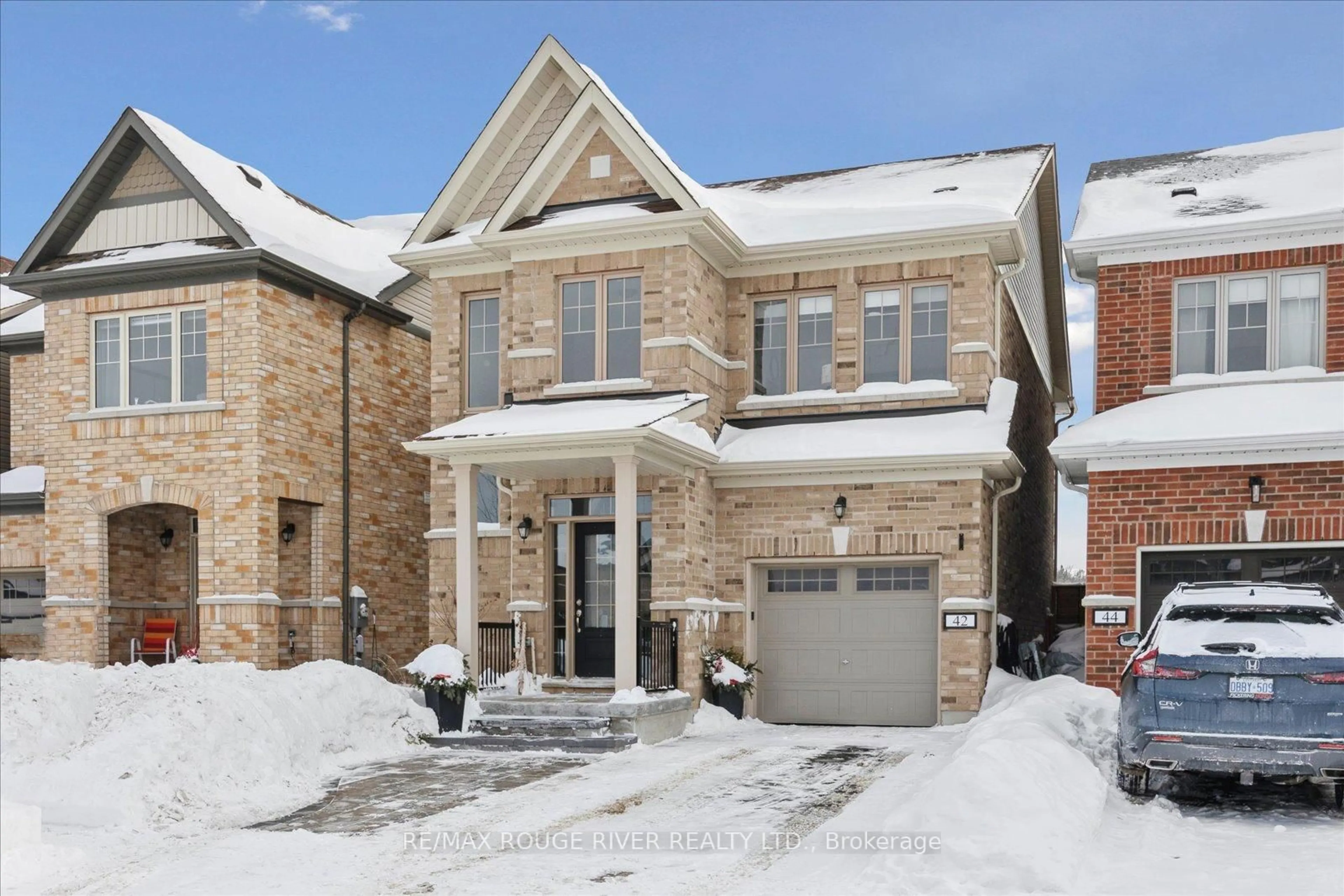 Home with brick exterior material, street for 42 Doctor Archer Dr, Scugog Ontario L9L 0A9