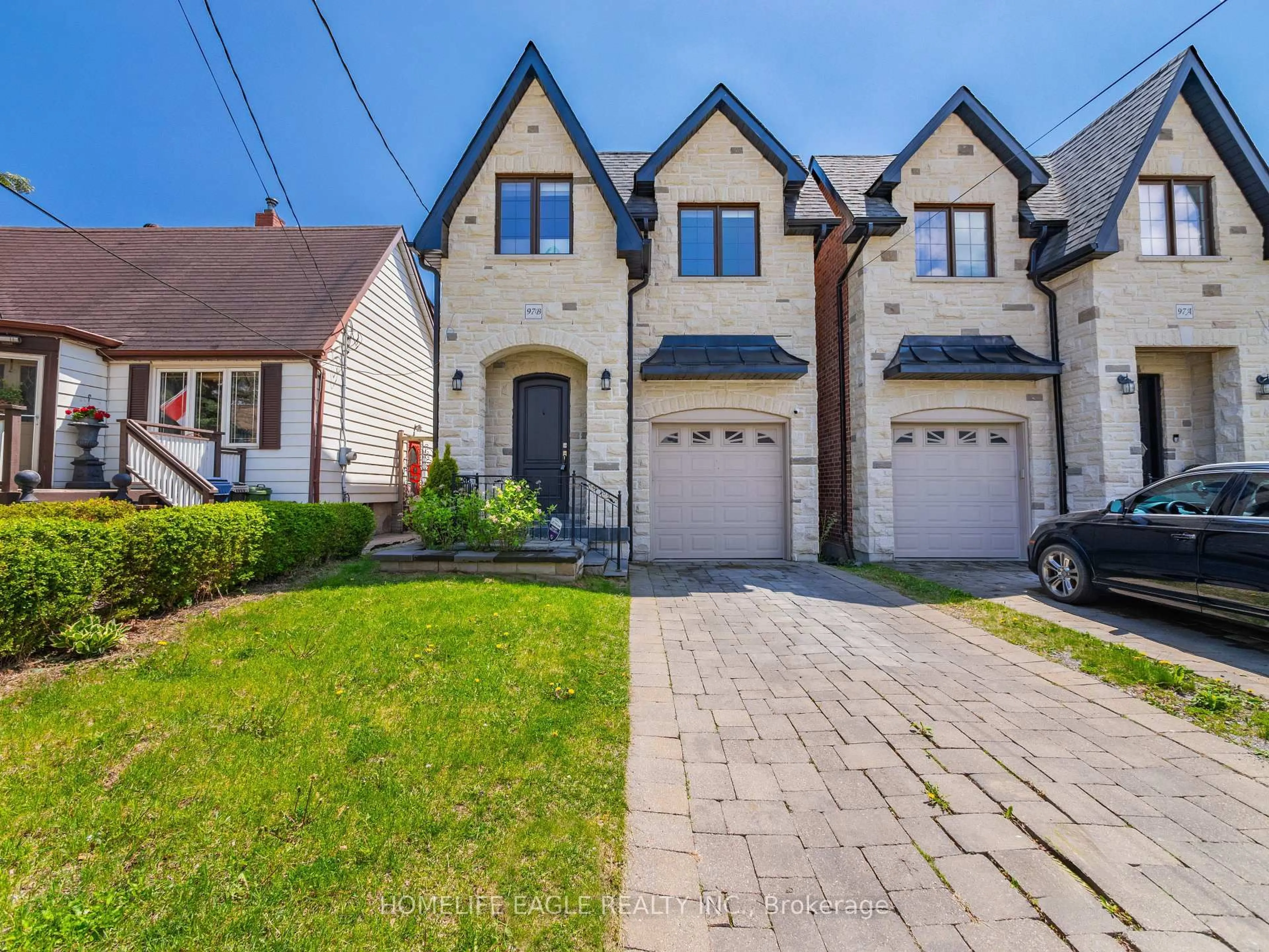 Home with brick exterior material, street for 97B Craiglee Dr, Toronto Ontario M1N 2M8