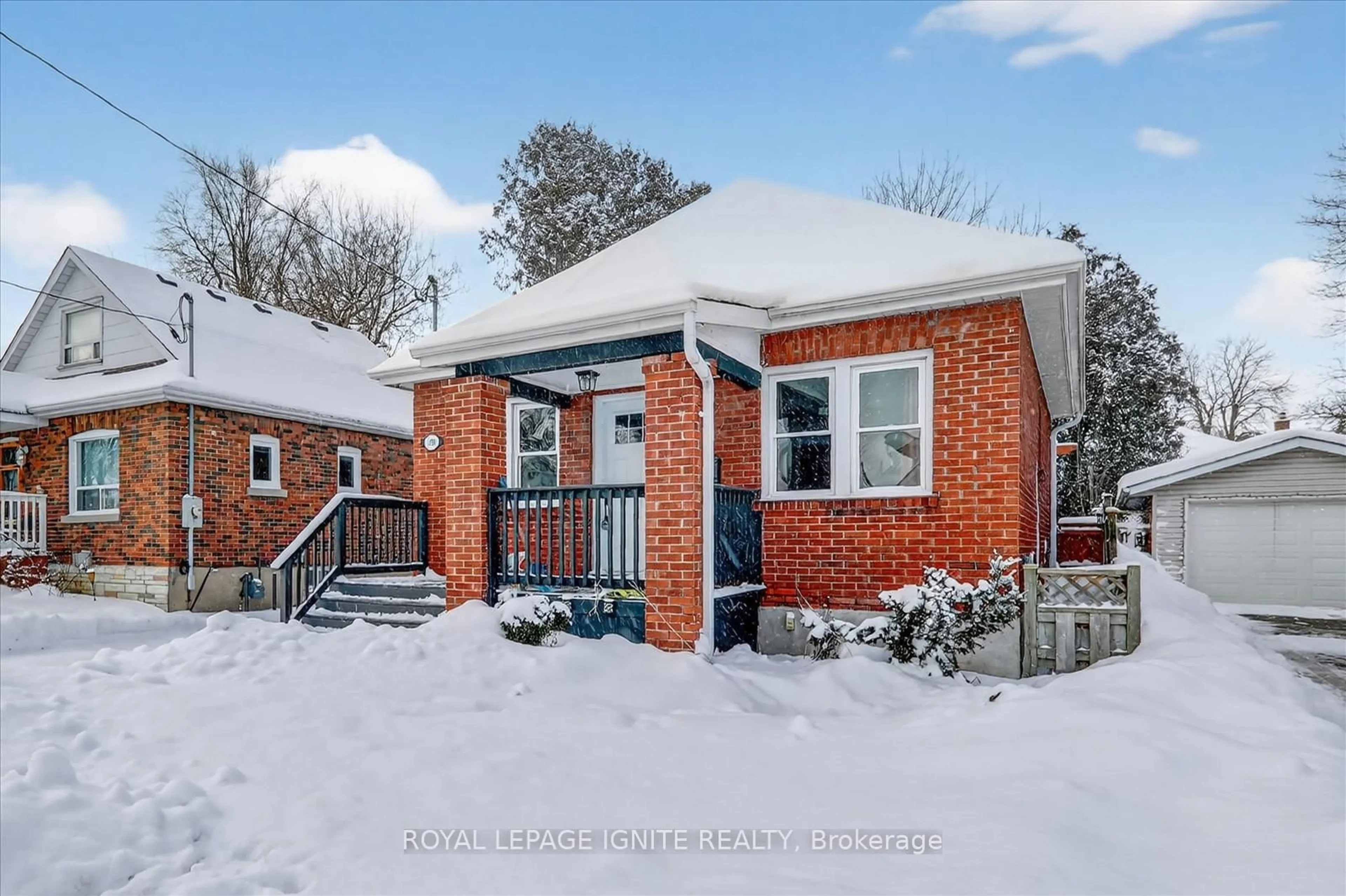 Home with brick exterior material, street for 390 Jarvis St, Oshawa Ontario L1G 5L2