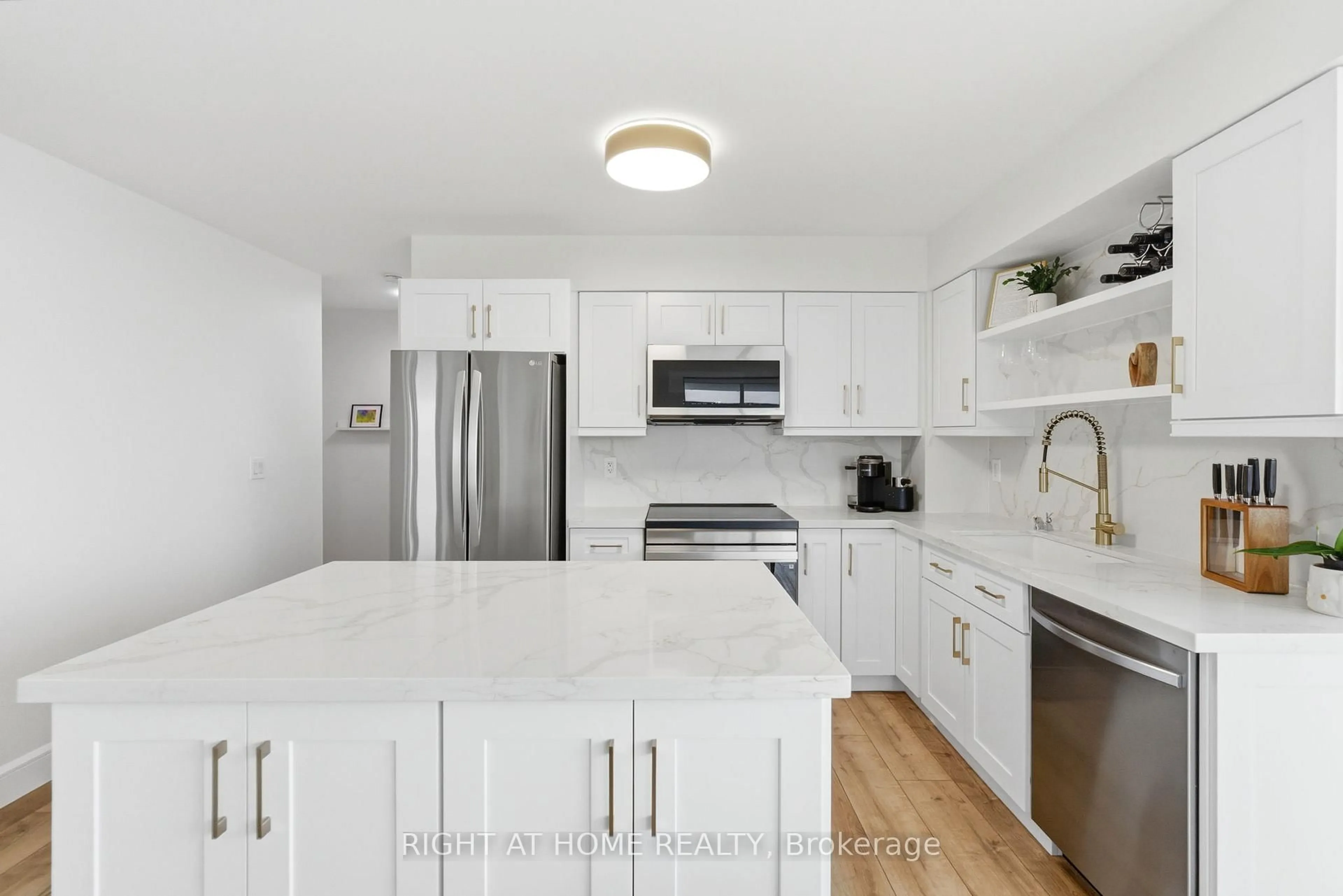 Open concept kitchen, ceramic/tile floor for 1600 Charles St #711, Whitby Ontario L1N 0G4