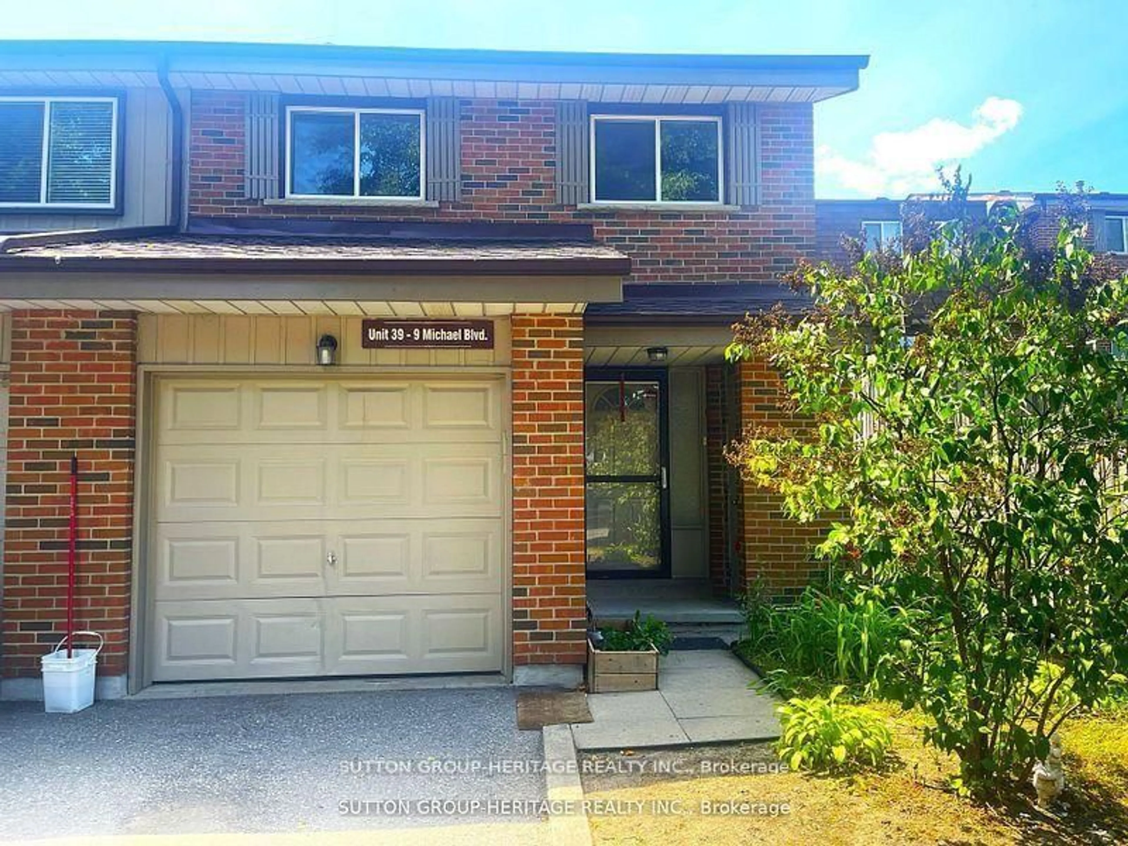 Home with brick exterior material, street for 9 Michael Blvd #39, Whitby Ontario L1N 5P4