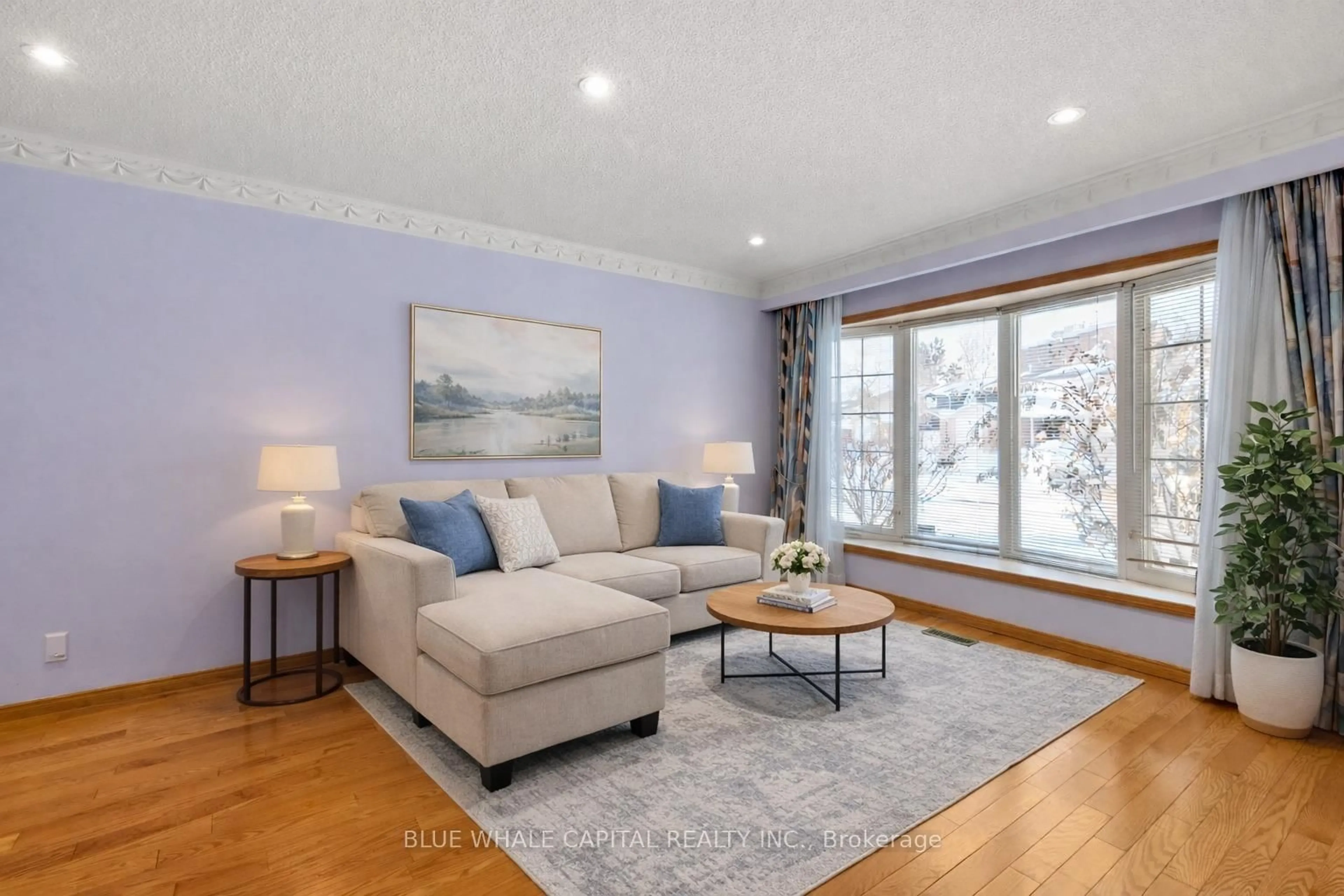 Living room with furniture, wood/laminate floor for 42 Fireside Dr, Toronto Ontario M1B 2E9