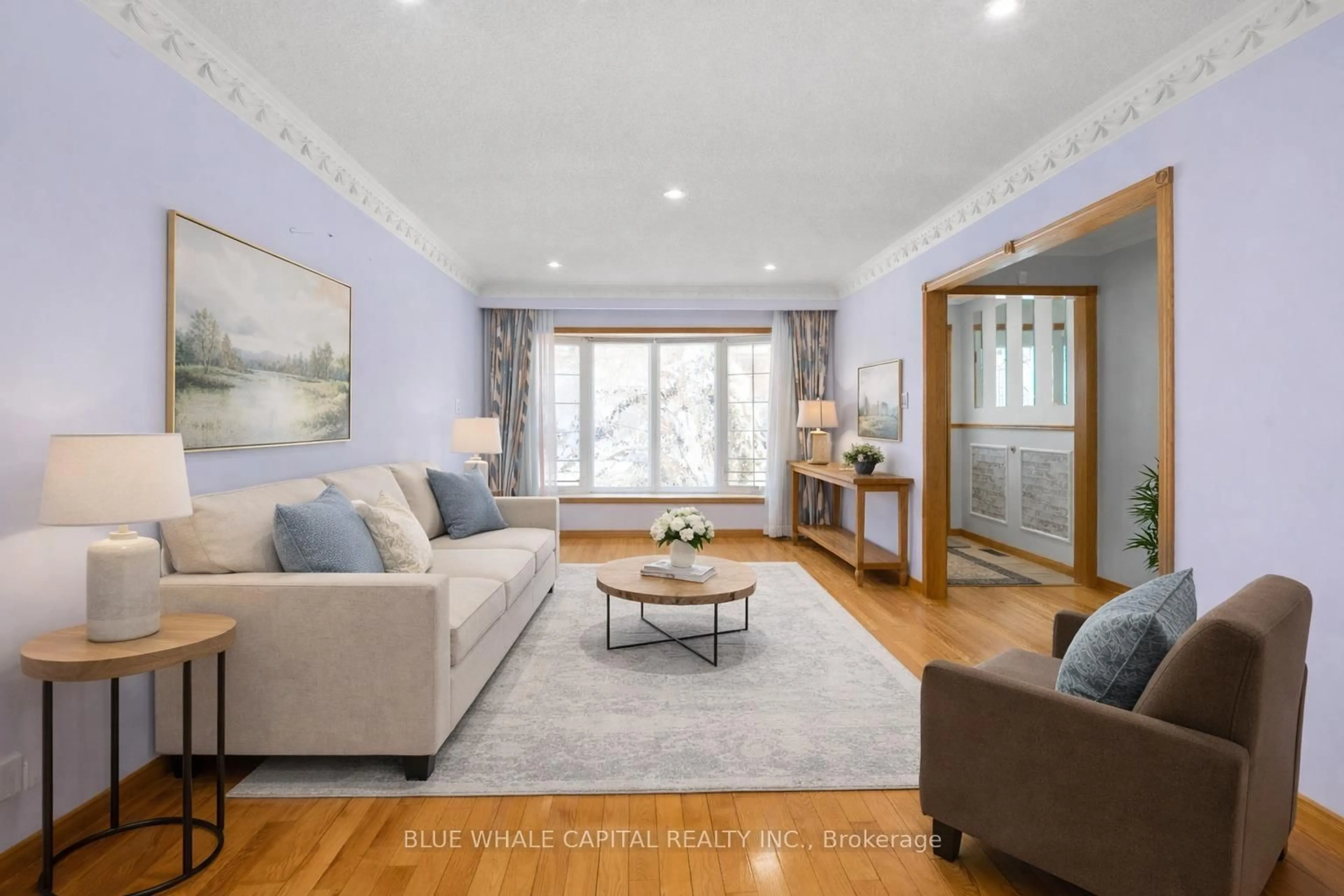 Living room with furniture, wood/laminate floor for 42 Fireside Dr, Toronto Ontario M1B 2E9