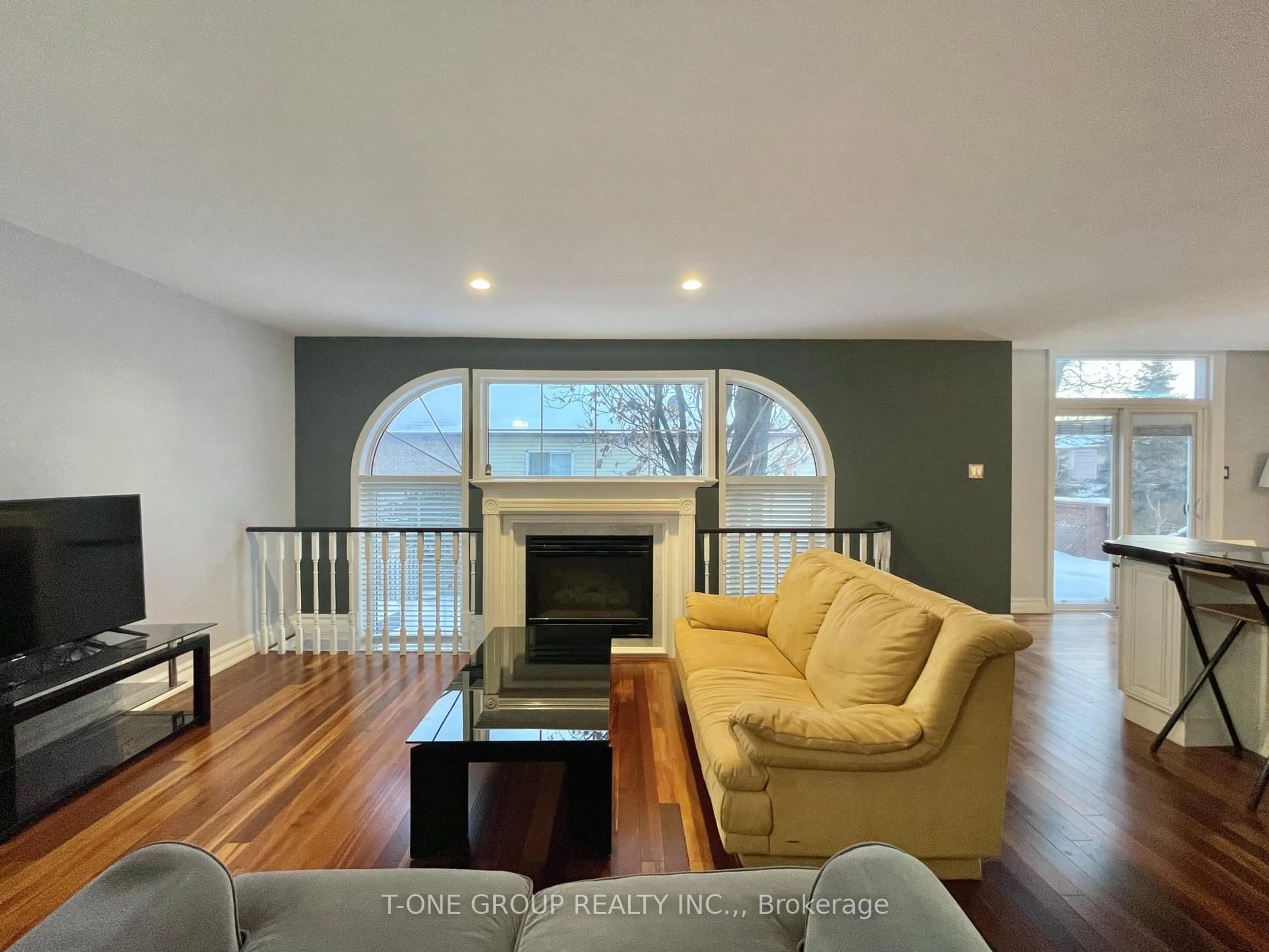 Living room with furniture, wood/laminate floor for 507 Dunlop St, Whitby Ontario L1N 1V3