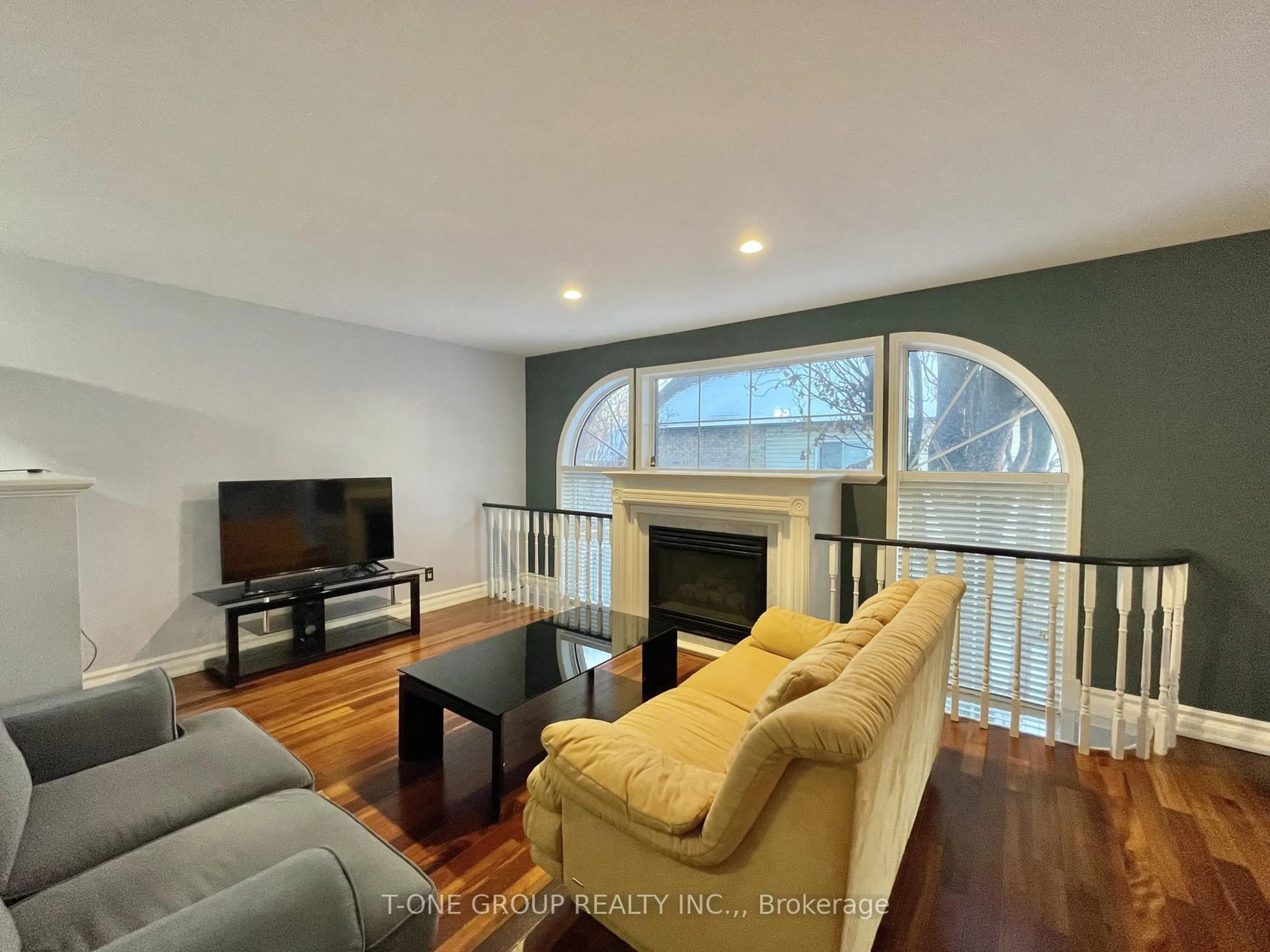 Living room with furniture, wood/laminate floor for 507 Dunlop St, Whitby Ontario L1N 1V3