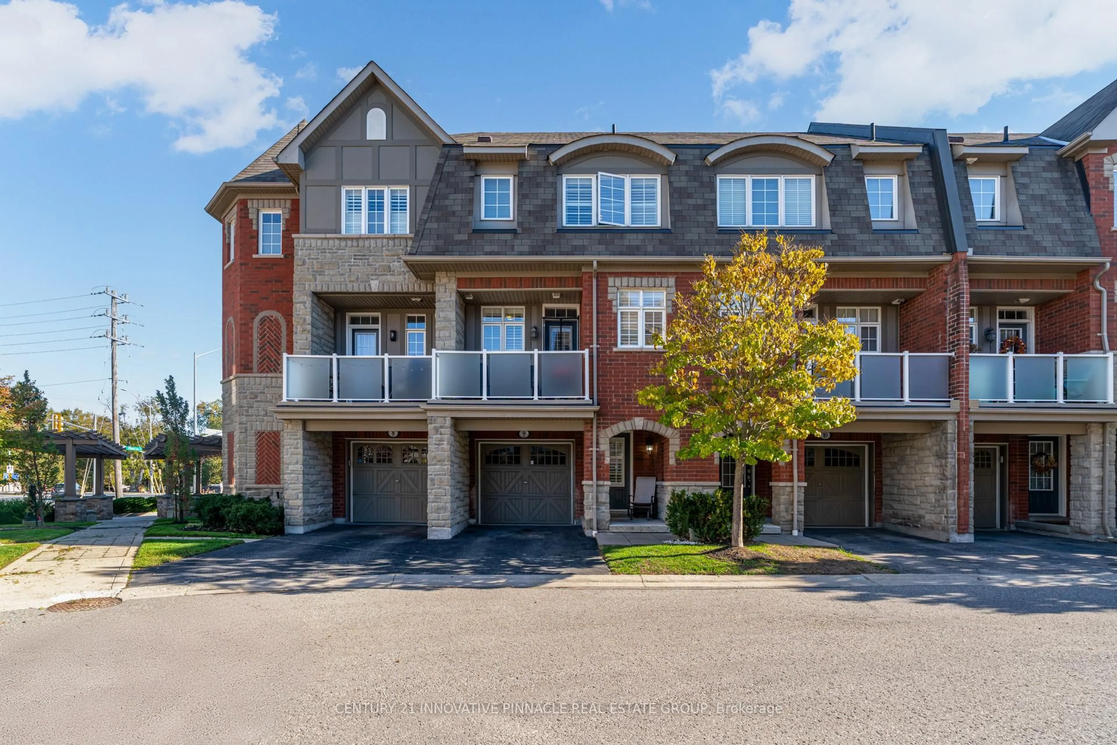 Home with brick exterior material, street for 1701 Finch Ave #9, Pickering Ontario L1V 0B7