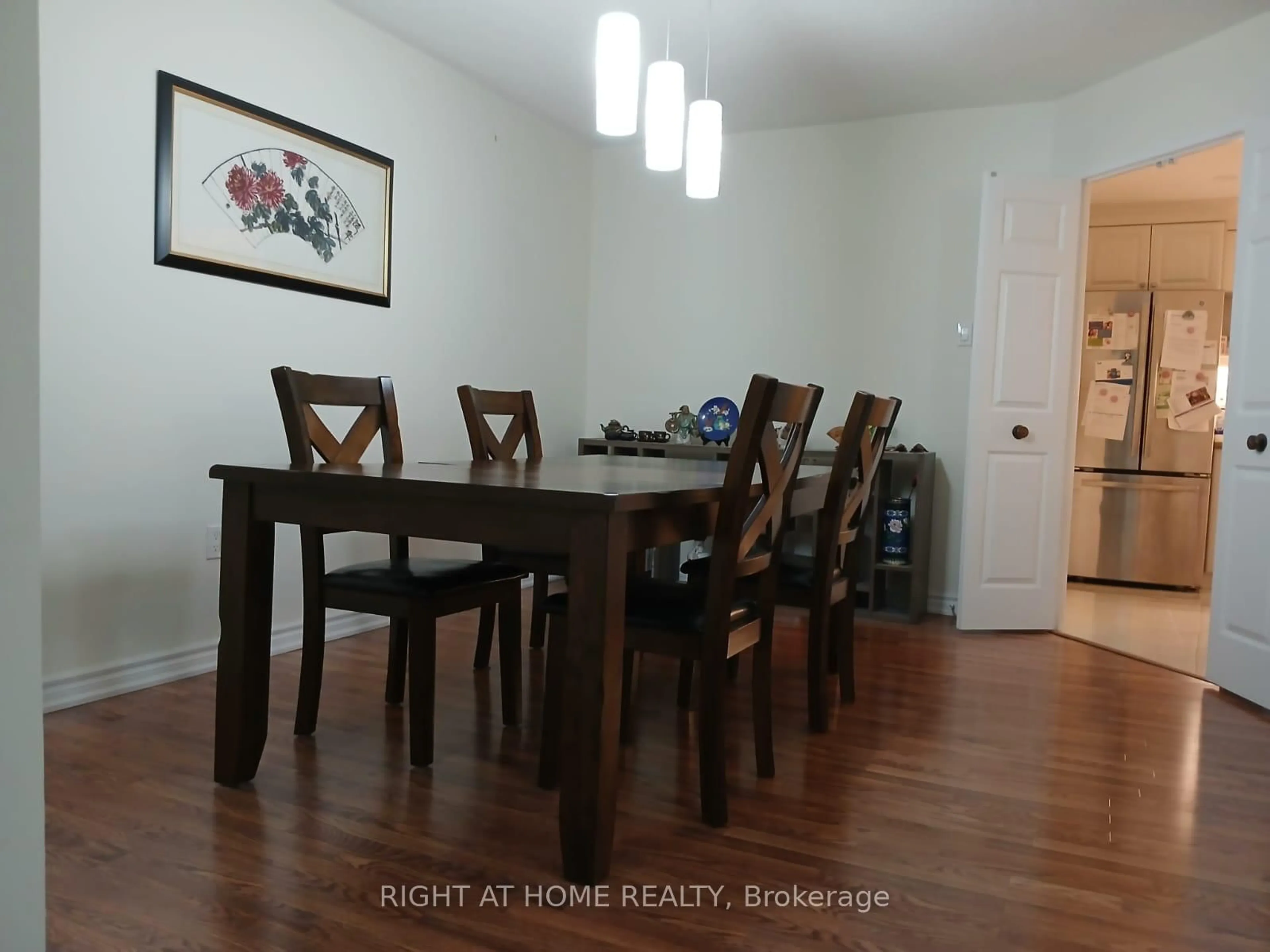 Dining room, wood/laminate floor for 2330 Bridletowne Circ #1901, Toronto Ontario M1W 3P6