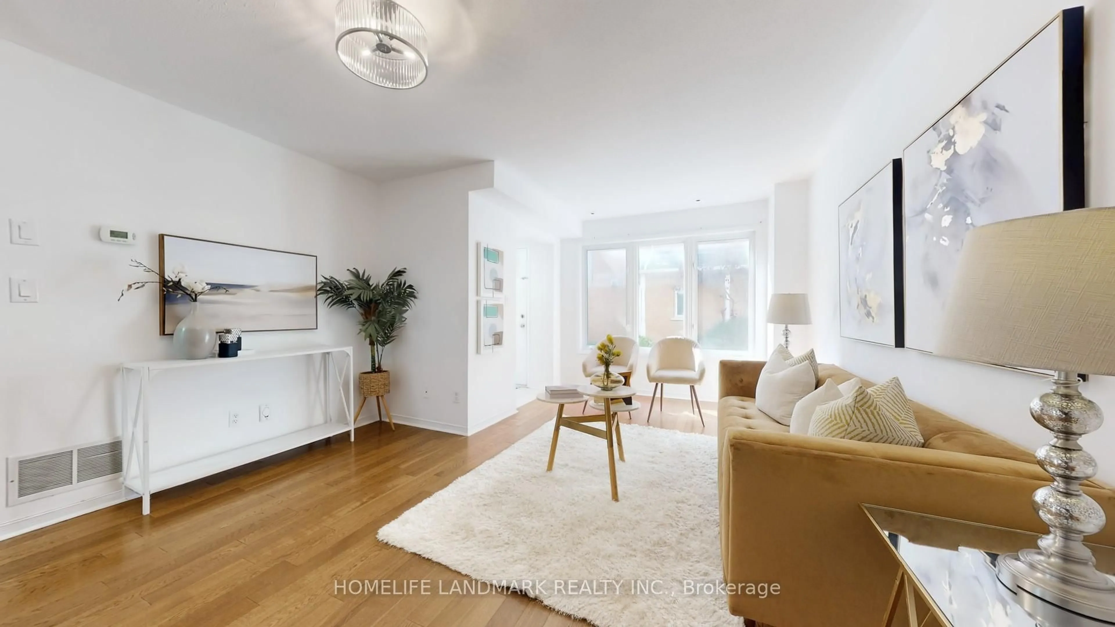 Living room with furniture, unknown for 28 Rosebank Dr #706, Toronto Ontario M1B 5Z1