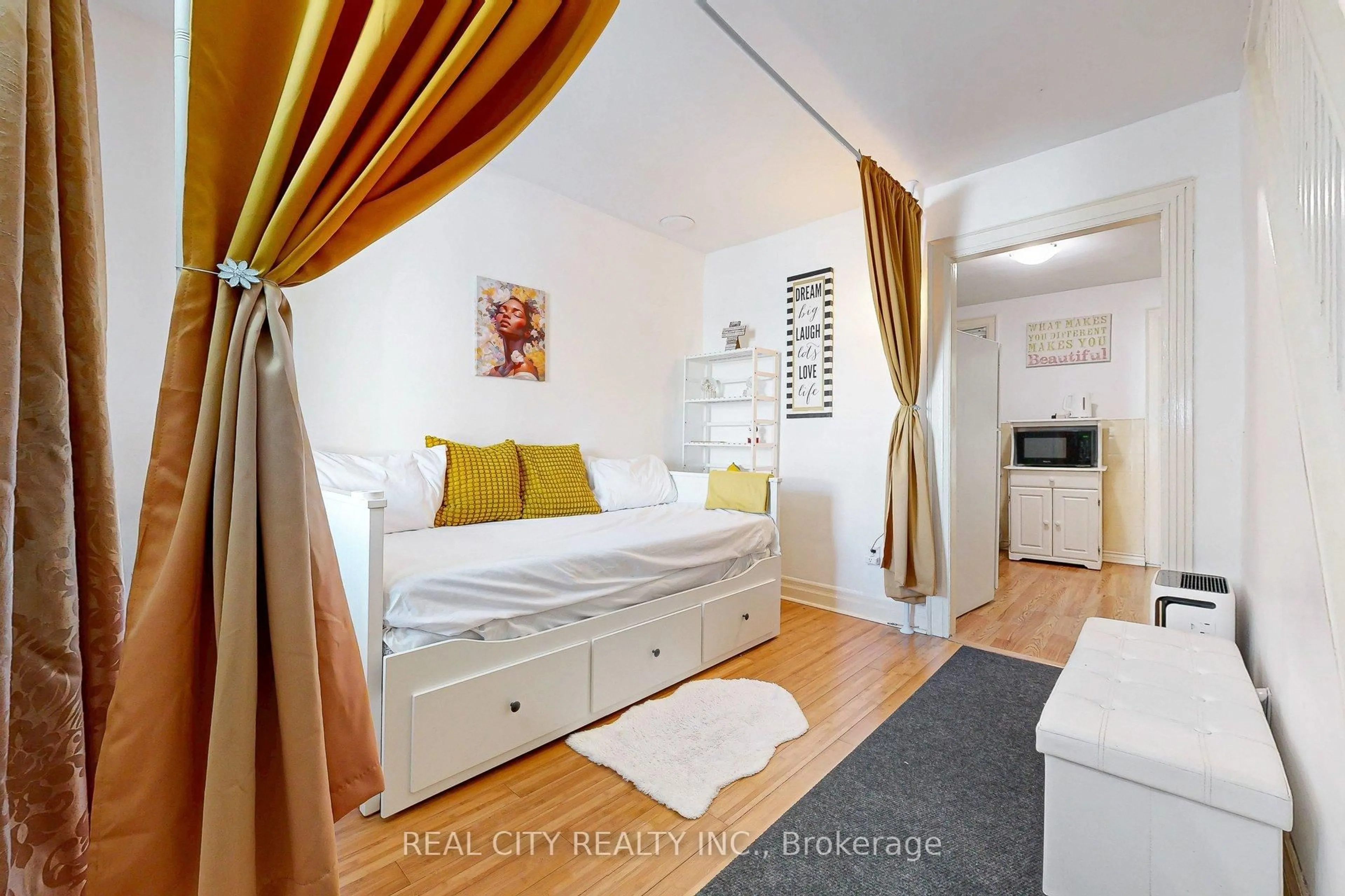 Bedroom with bed, wood/laminate floor for 163 Olive Ave, Oshawa Ontario L1H 2P1