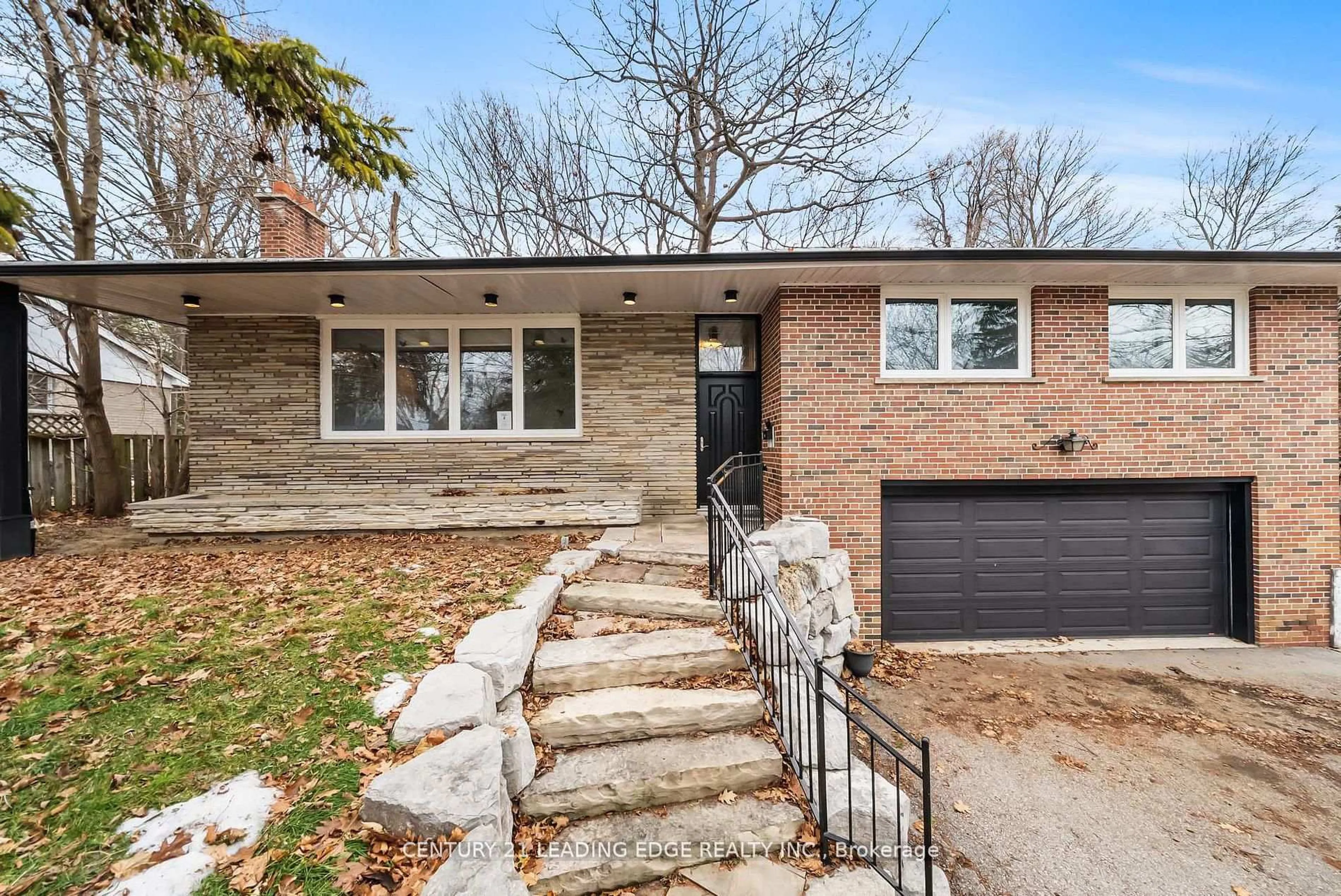 Home with brick exterior material, street for 541 Rouge Hills Dr, Toronto Ontario M1C 2Z9