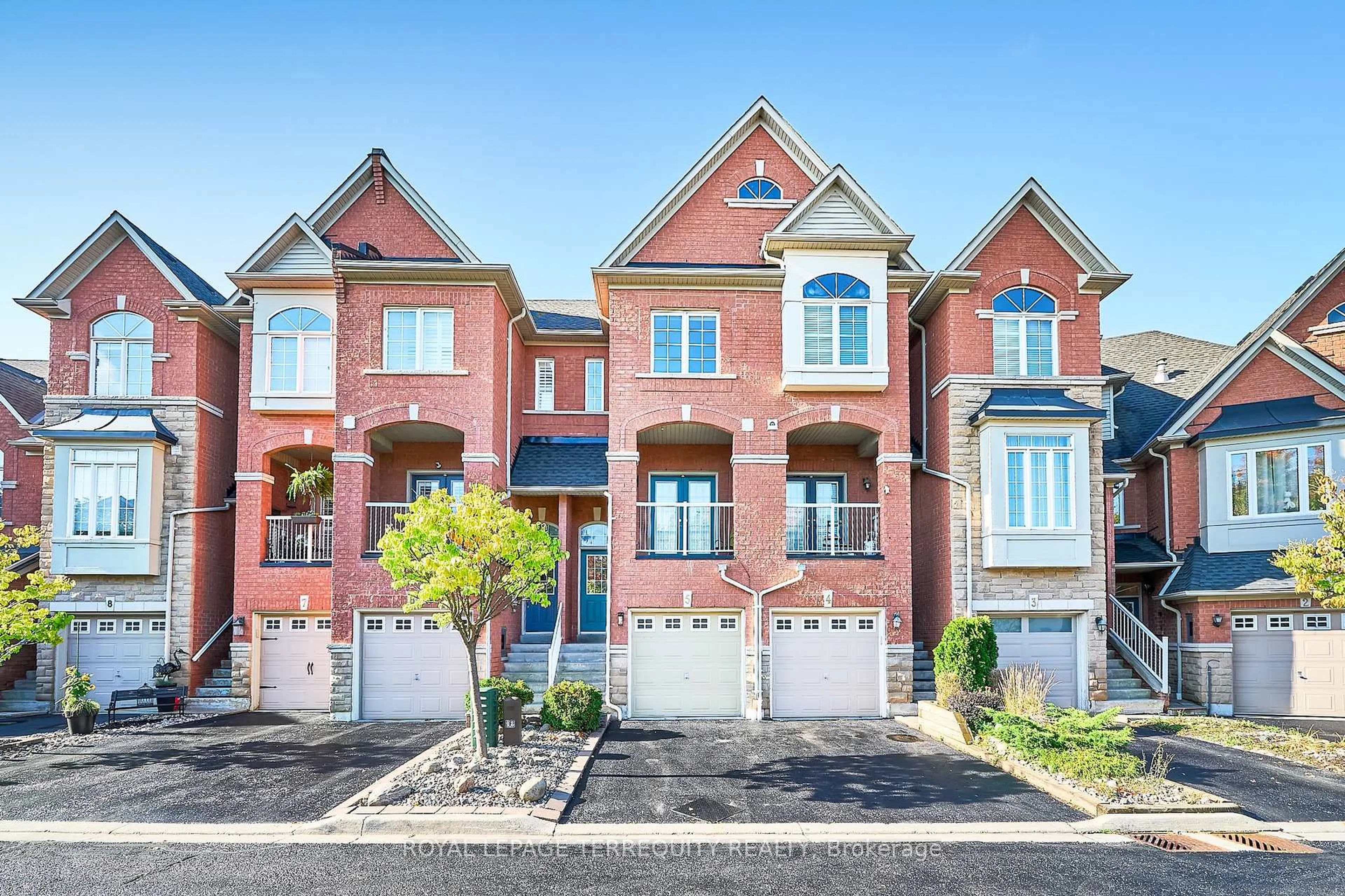 Home with brick exterior material, street for 301 Strouds Lane #5, Pickering Ontario L1V 7J1