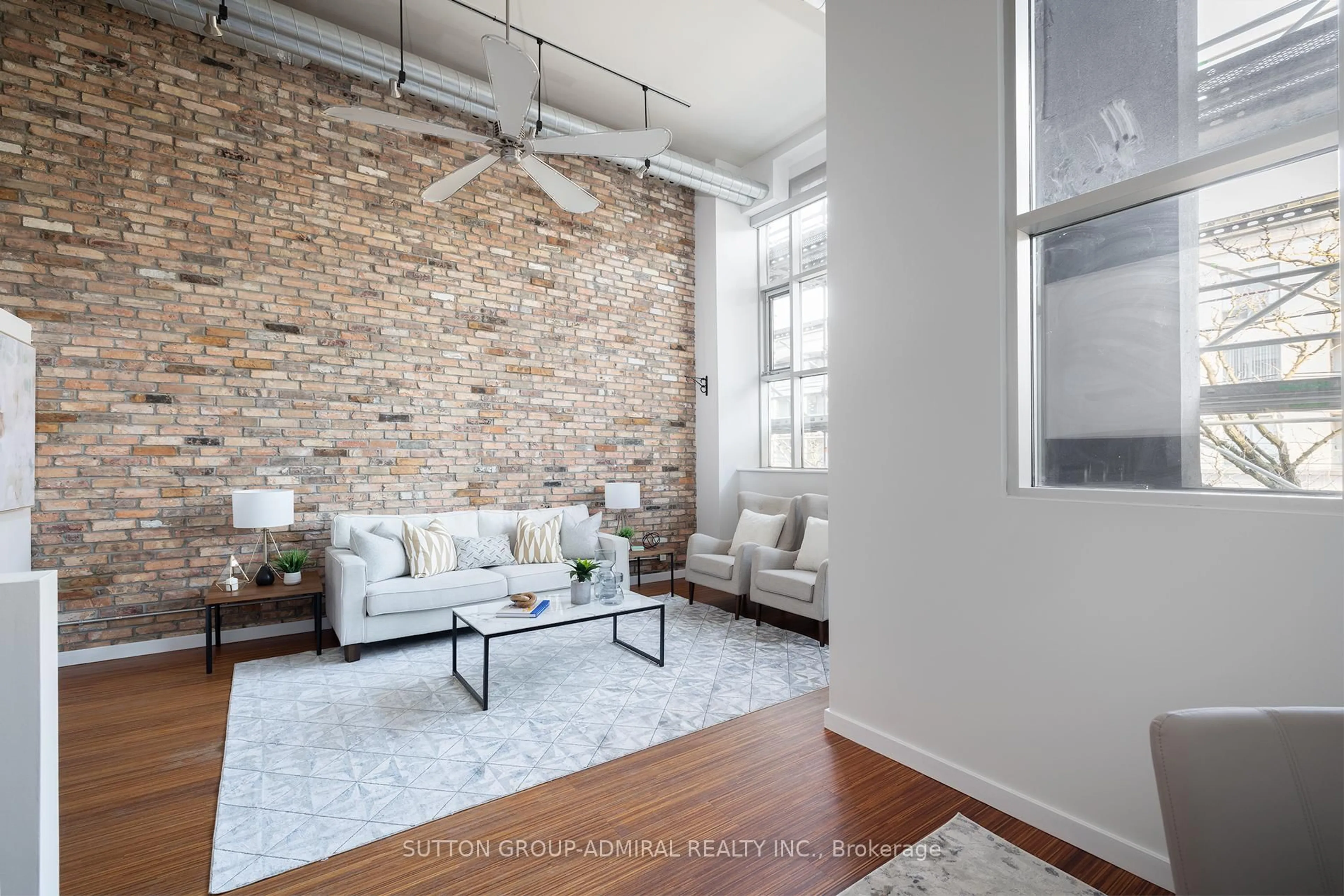 Living room with furniture, unknown for 1852 Queen St #201, Toronto Ontario M4L 1H1