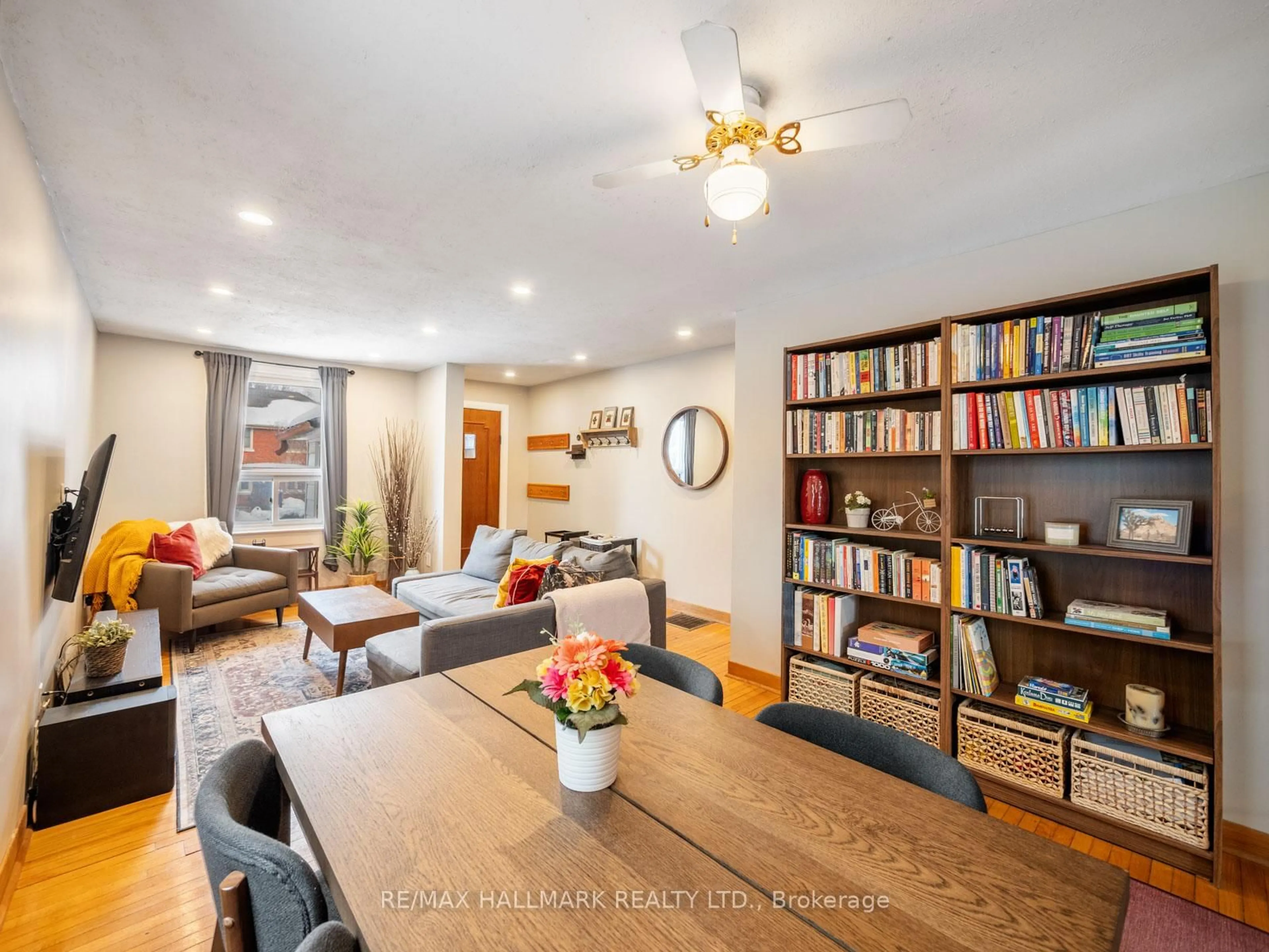 Living room with furniture, wood/laminate floor for 27 Winston Ave, Toronto Ontario M1N 1W2