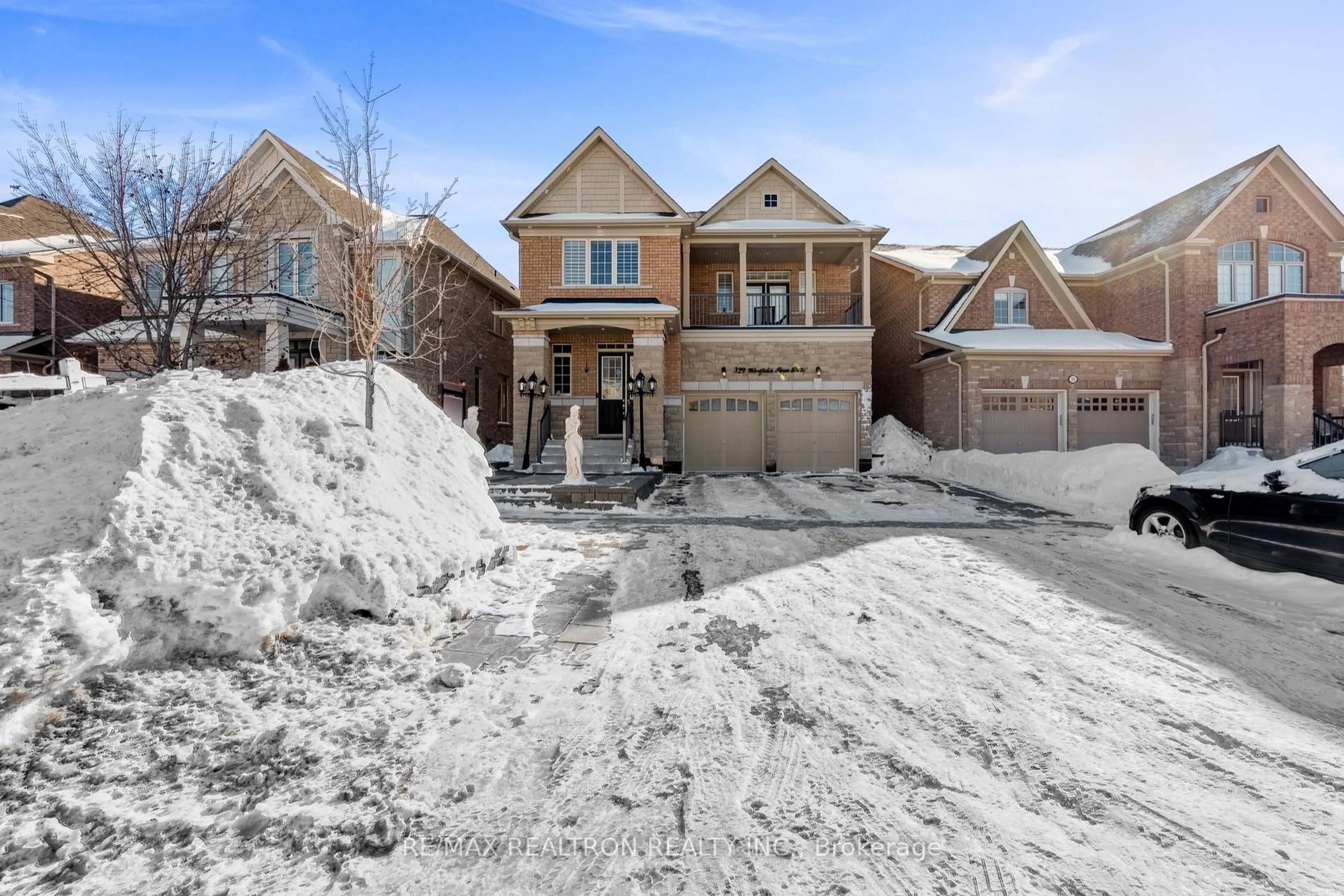 Home with brick exterior material, street for 329 Windfield Farm Dr, Oshawa Ontario L1L 0M2