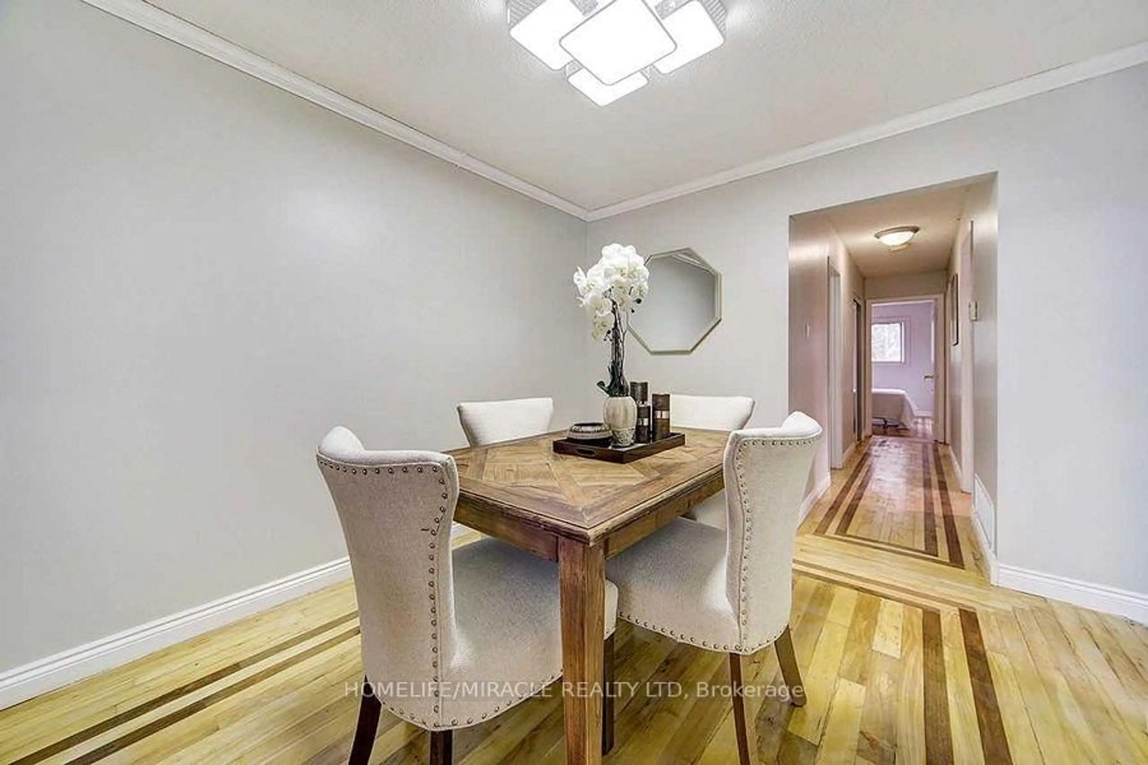 Dining room, wood/laminate floor for 72 Lowry Sq, Toronto Ontario M1B 1N6