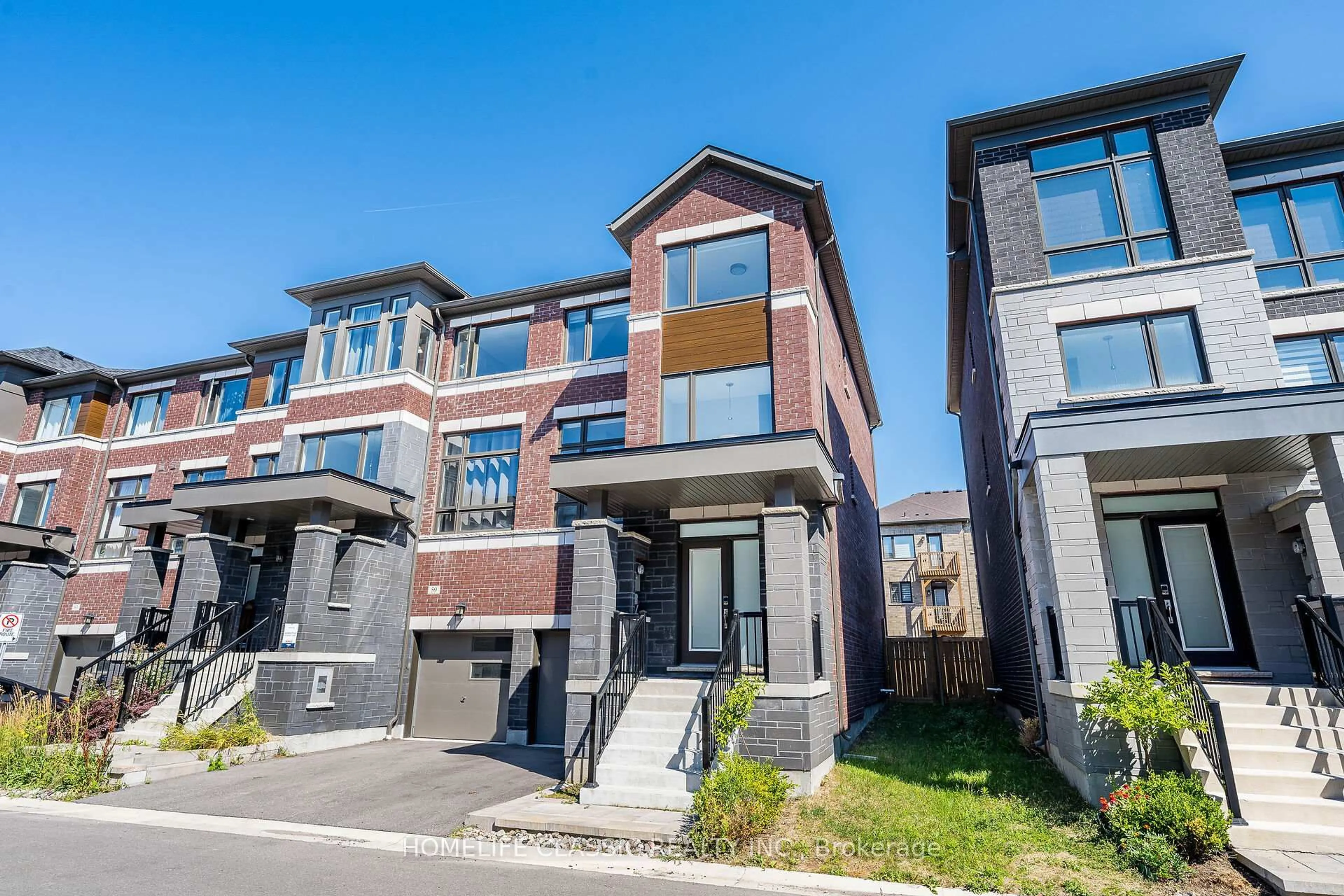 Home with brick exterior material, street for 57 Douet Lane, Ajax Ontario L1Z 0V4