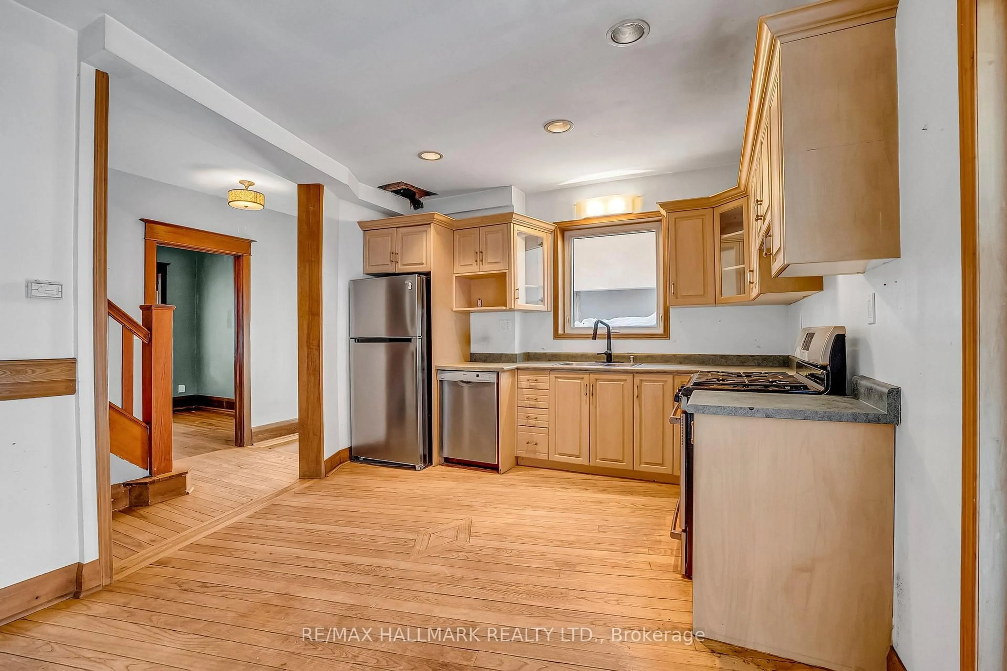 Open concept kitchen, wood/laminate floor for 4 Meadow Ave, Toronto Ontario M1N 1V6