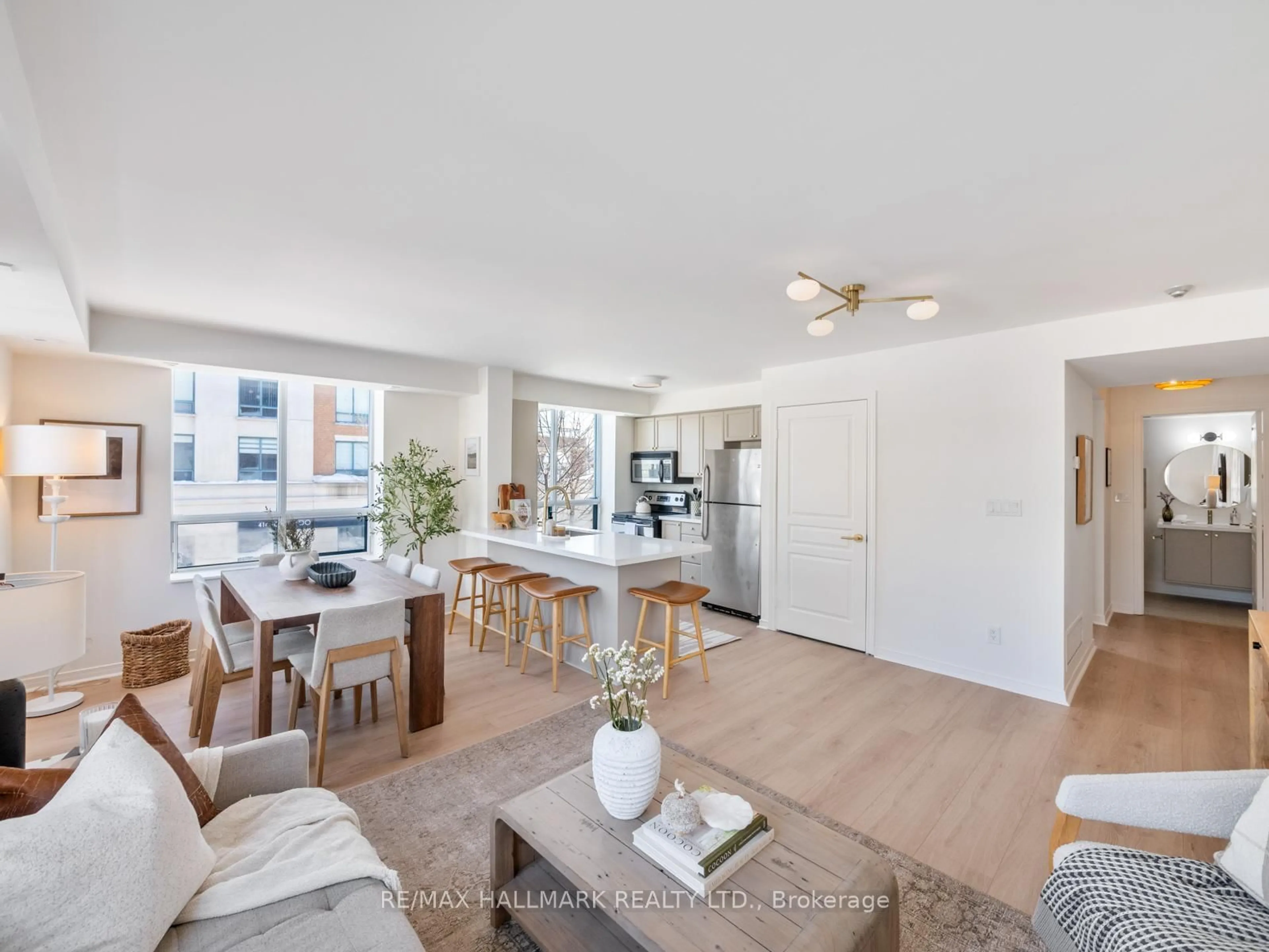 Open concept kitchen, unknown for 1765 Queen St #211, Toronto Ontario M4L 3Z2