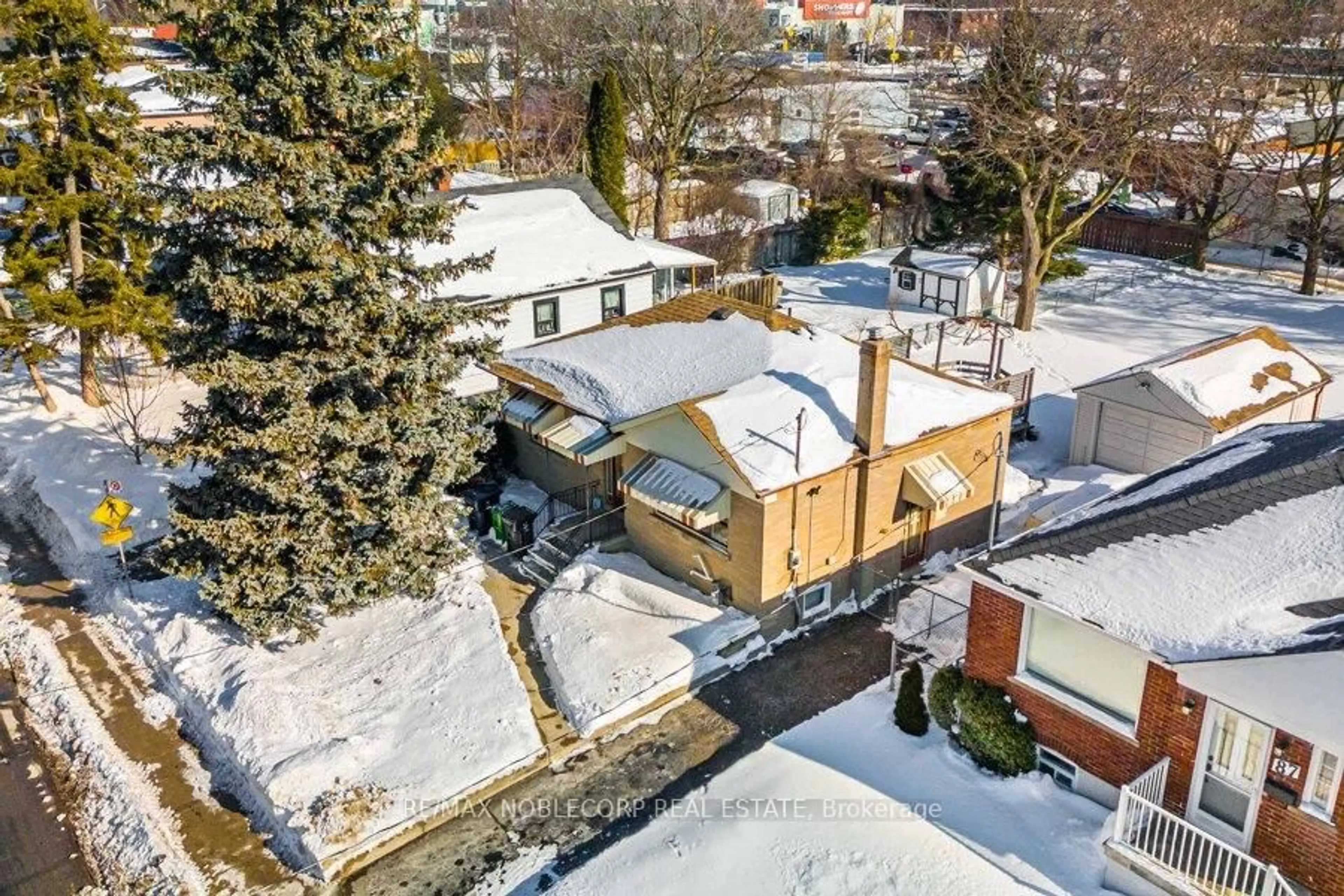 A pic from outside/outdoor area/front of a property/back of a property/a pic from drone, street for 93 McIntosh St, Toronto Ontario M1N 3Y6