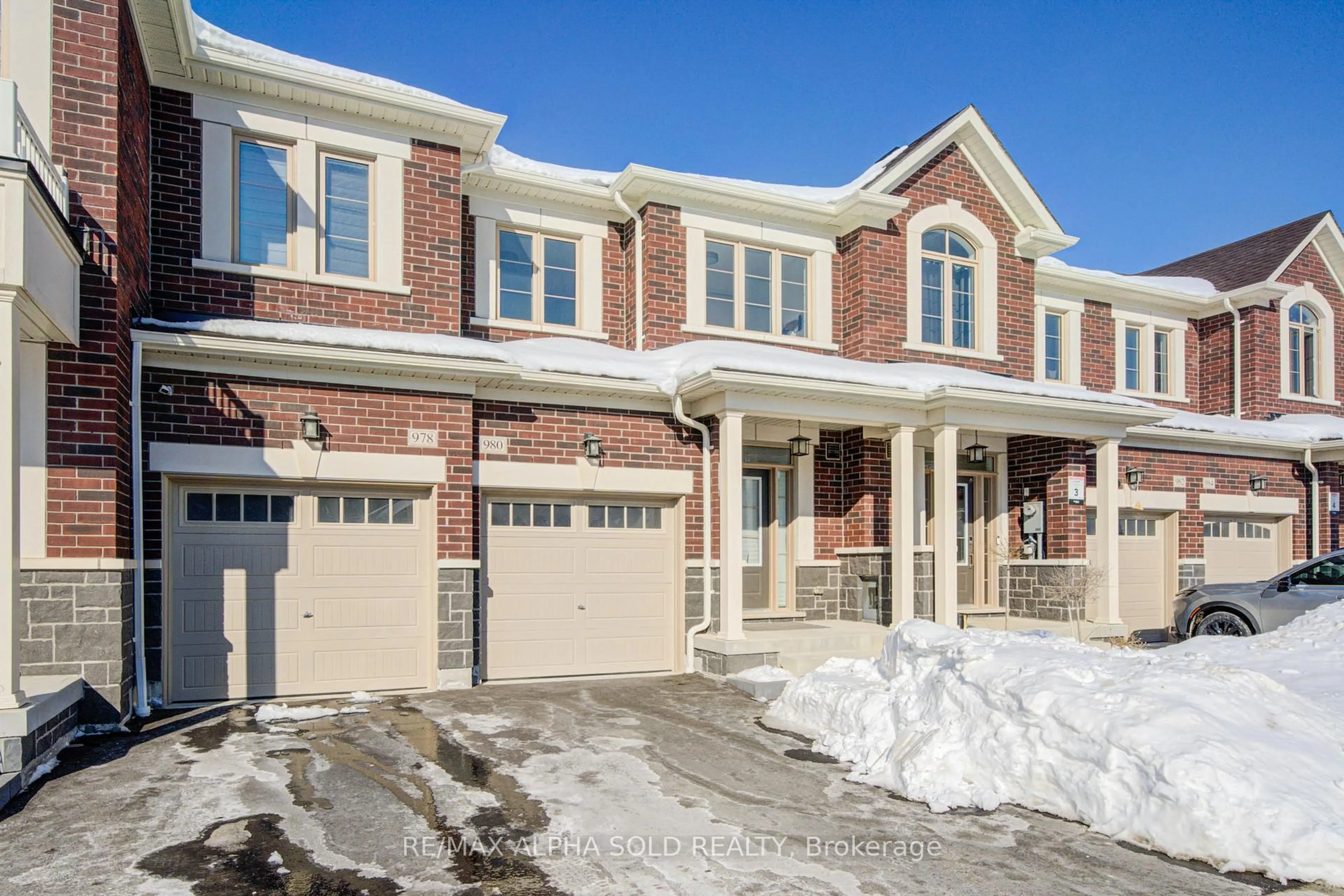 Home with brick exterior material, street for 980 Crowsnest Hollow Ave, Pickering Ontario L1X 0P4