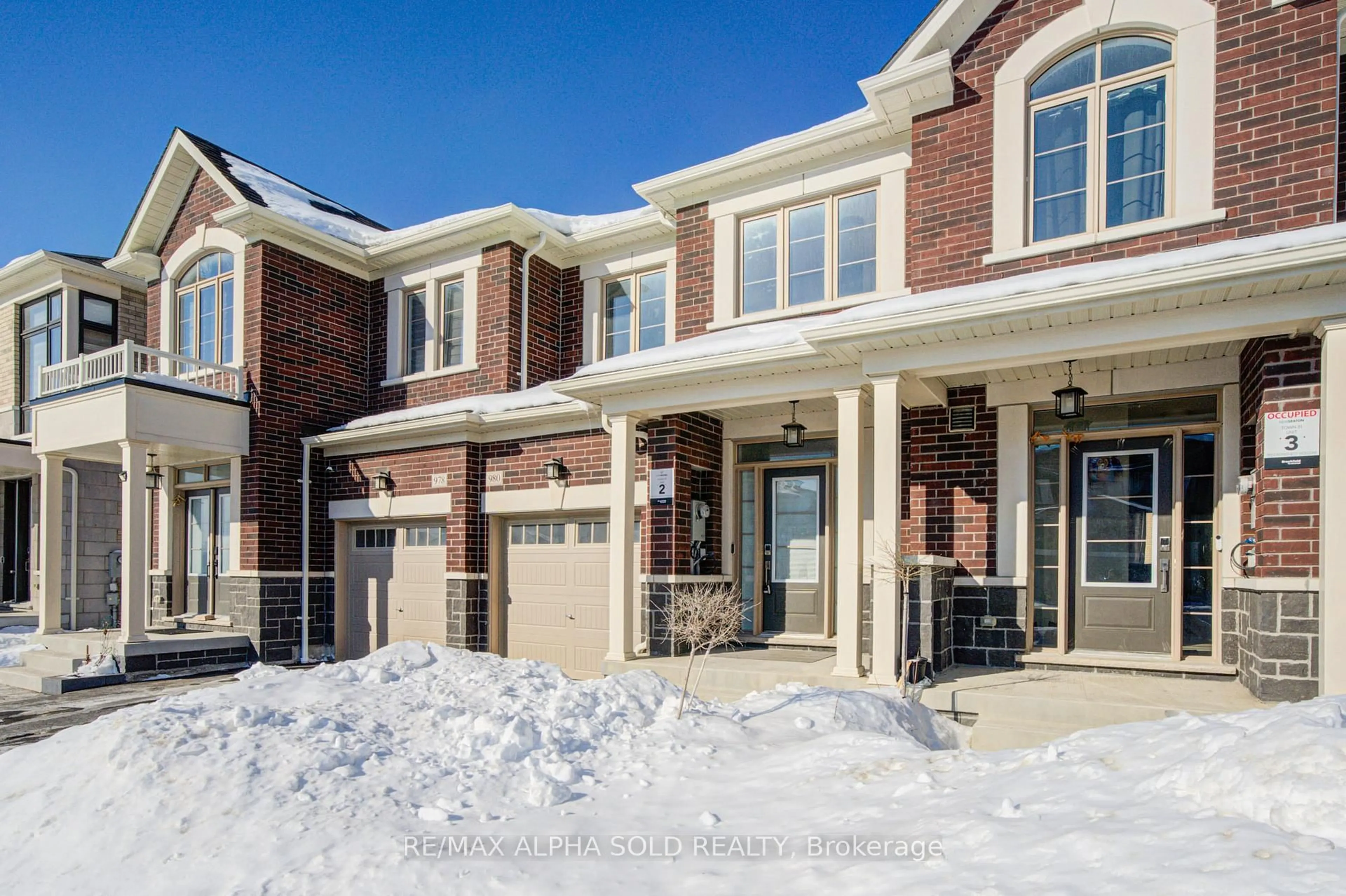 Home with brick exterior material, street for 980 Crowsnest Hollow Ave, Pickering Ontario L1X 0P4